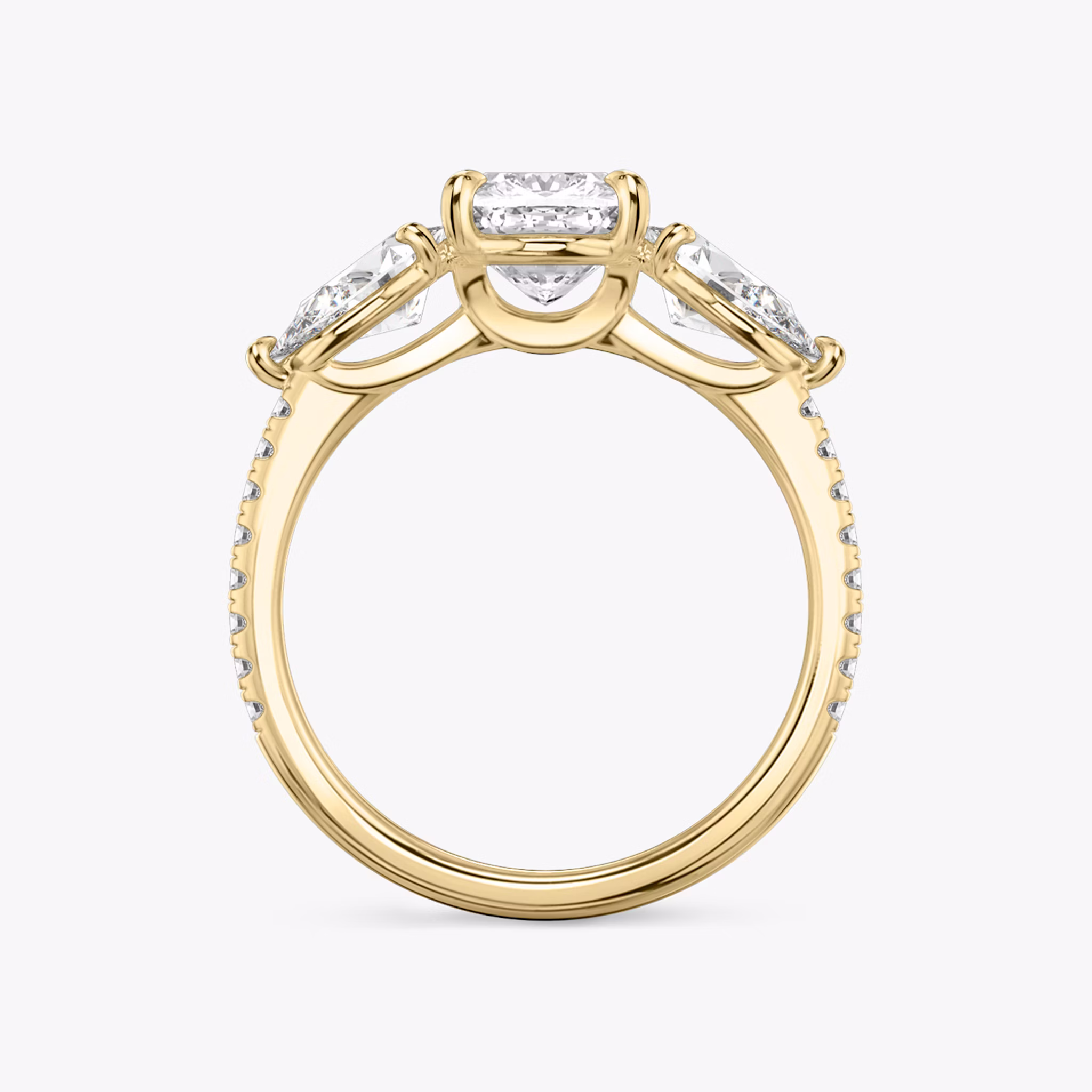 The Three Stone | Cushion | 18k | Yellow Gold | bandAccent: Pavé | sideStoneCarat: 0.50ct | sideStoneShape: Pear | diamondOrientation: vertical | caratWeight: other