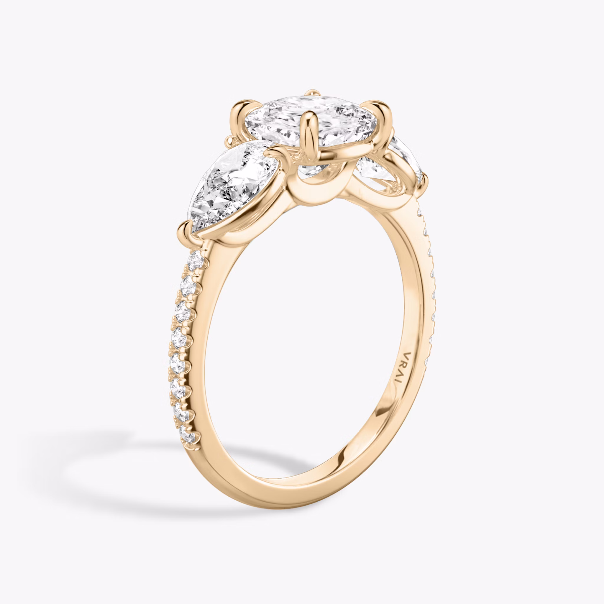 The Three Stone | Cushion | 14k | Rose Gold | bandAccent: Pavé | sideStoneCarat: 0.50ct | sideStoneShape: Pear | diamondOrientation: vertical | caratWeight: other
