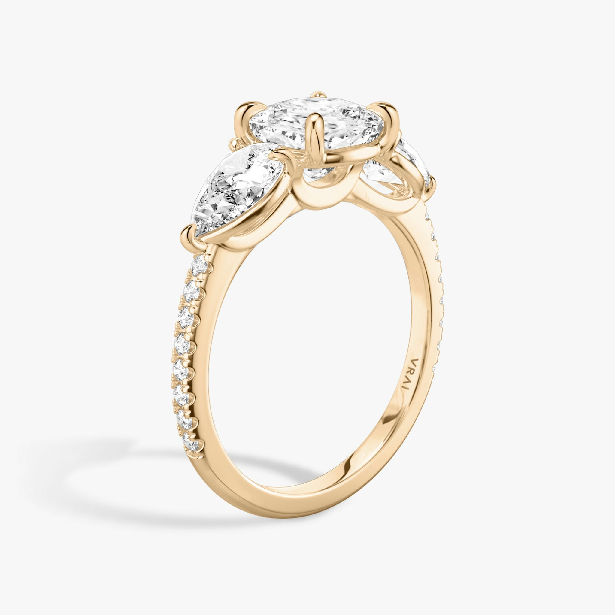The Three Stone | Cushion | 14k | Rose Gold | bandAccent: Pavé | sideStoneCarat: 0.50ct | sideStoneShape: Pear | diamondOrientation: vertical | caratWeight: other