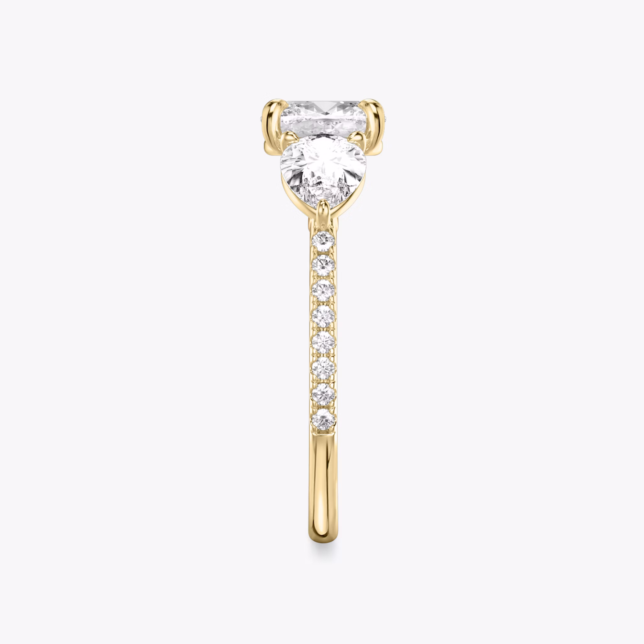 The Three Stone | Cushion | 18k | Yellow Gold | bandAccent: Pavé | sideStoneCarat: 0.50ct | sideStoneShape: Pear | diamondOrientation: vertical | caratWeight: other