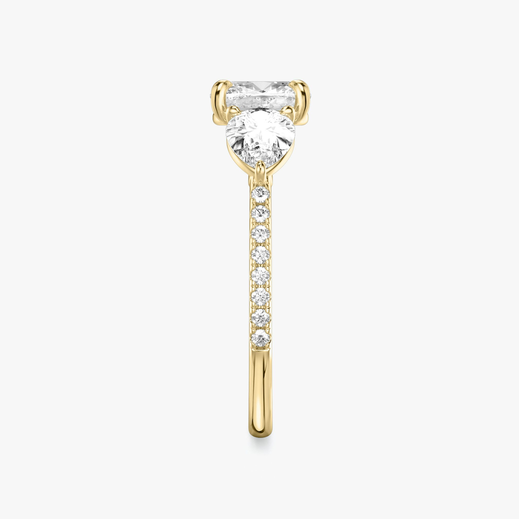 The Three Stone | Cushion | 18k | Yellow Gold | bandAccent: Pavé | sideStoneCarat: 0.50ct | sideStoneShape: Pear | diamondOrientation: vertical | caratWeight: other