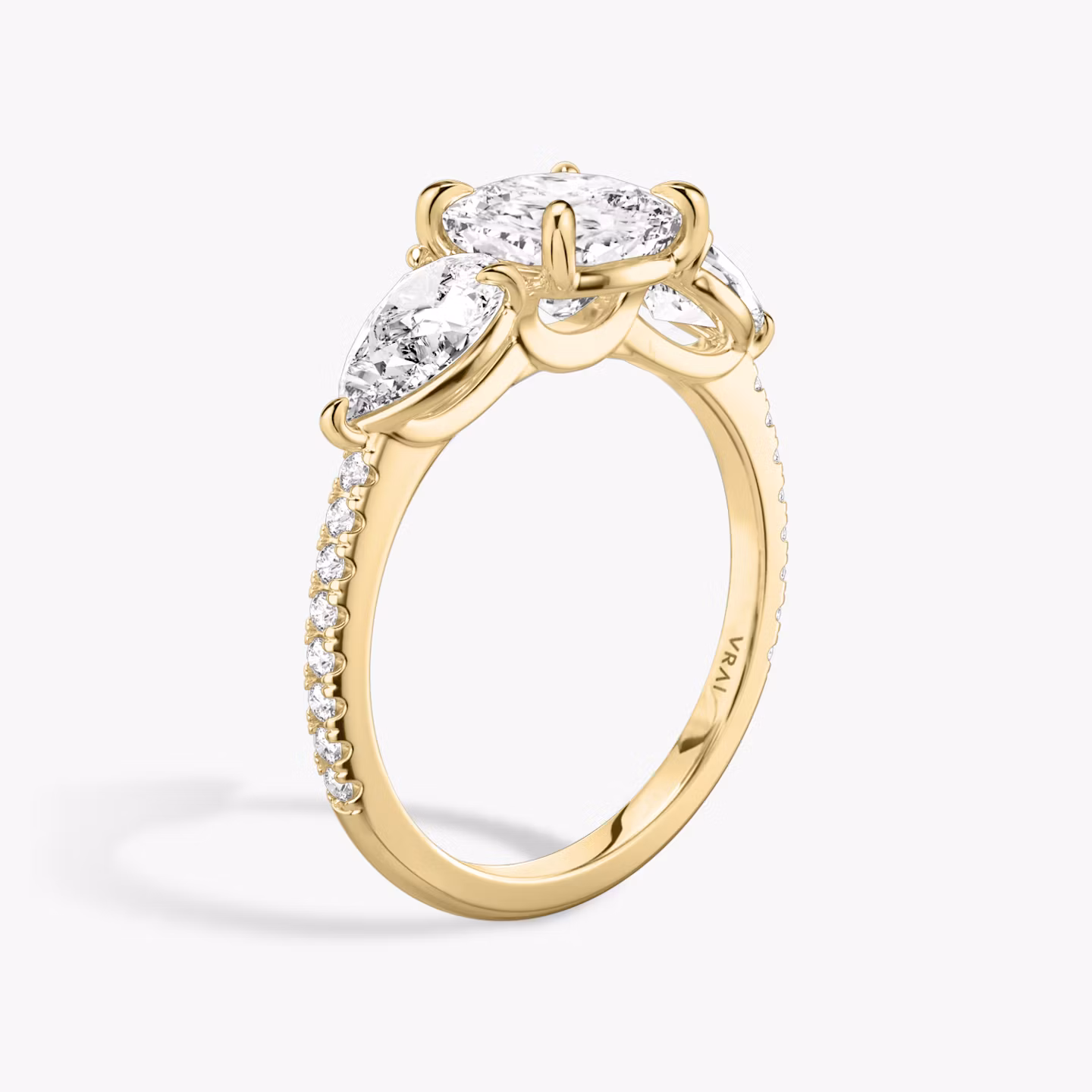 The Three Stone | Cushion | 18k | Yellow Gold | bandAccent: Pavé | sideStoneCarat: 0.50ct | sideStoneShape: Pear | diamondOrientation: vertical | caratWeight: other