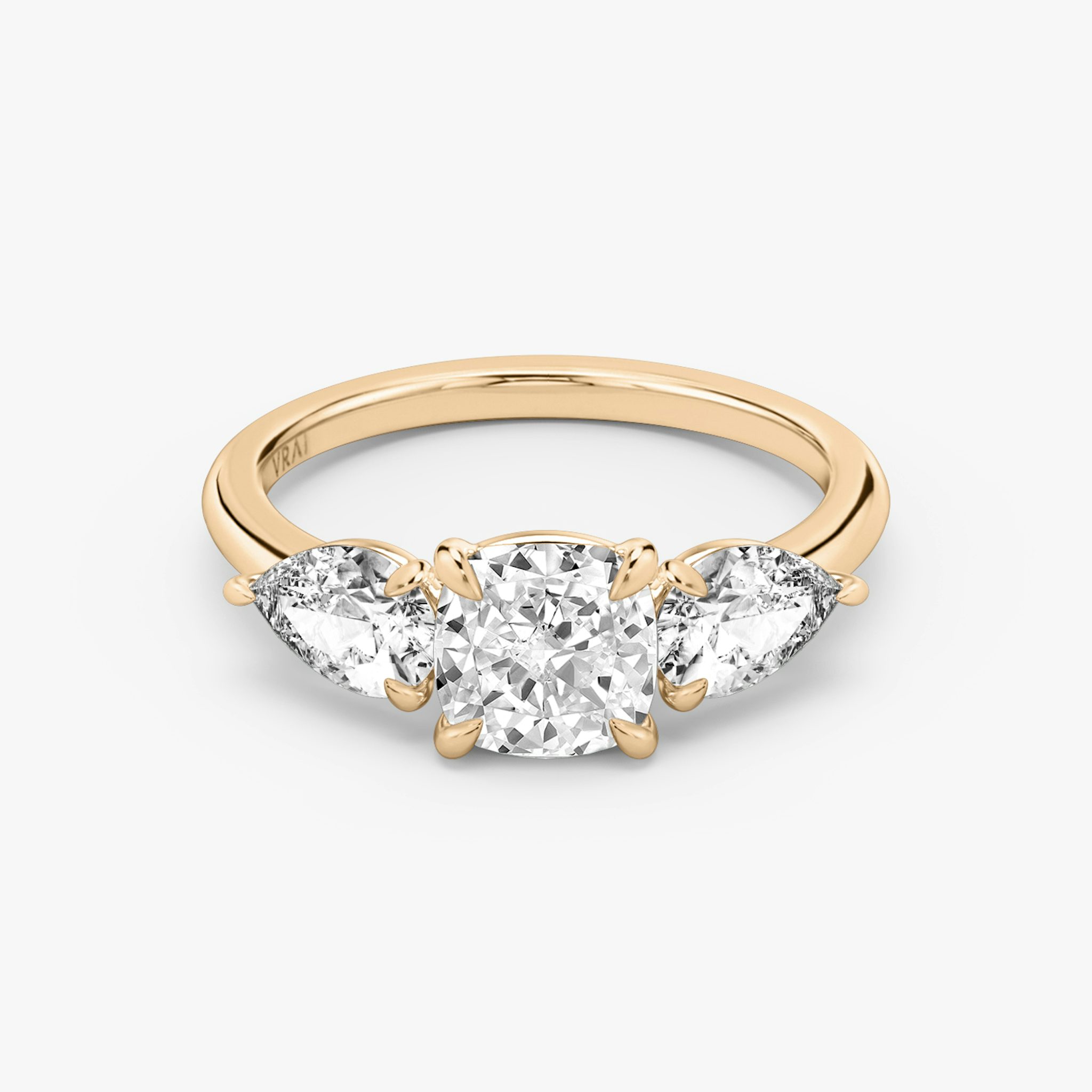 The Three Stone | Cushion | 14k | Rose Gold | bandAccent: Plain | sideStoneCarat: 0.50ct | sideStoneShape: Pear | diamondOrientation: vertical | caratWeight: other