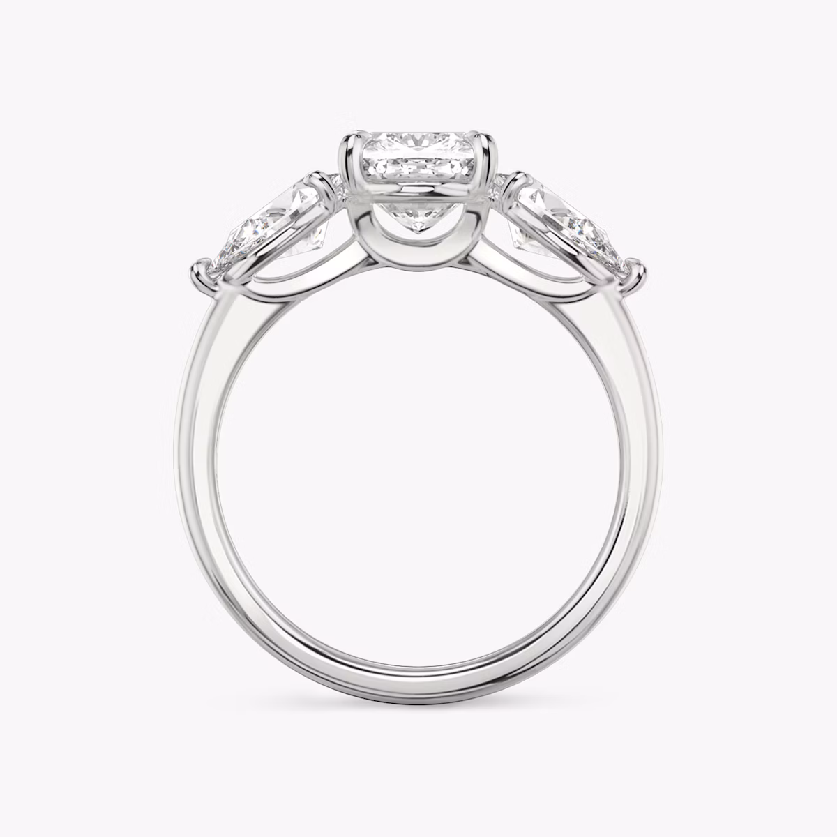 The Three Stone | Cushion | 18k | White Gold | bandAccent: Plain | sideStoneCarat: 0.50ct | sideStoneShape: Pear | diamondOrientation: vertical | caratWeight: other