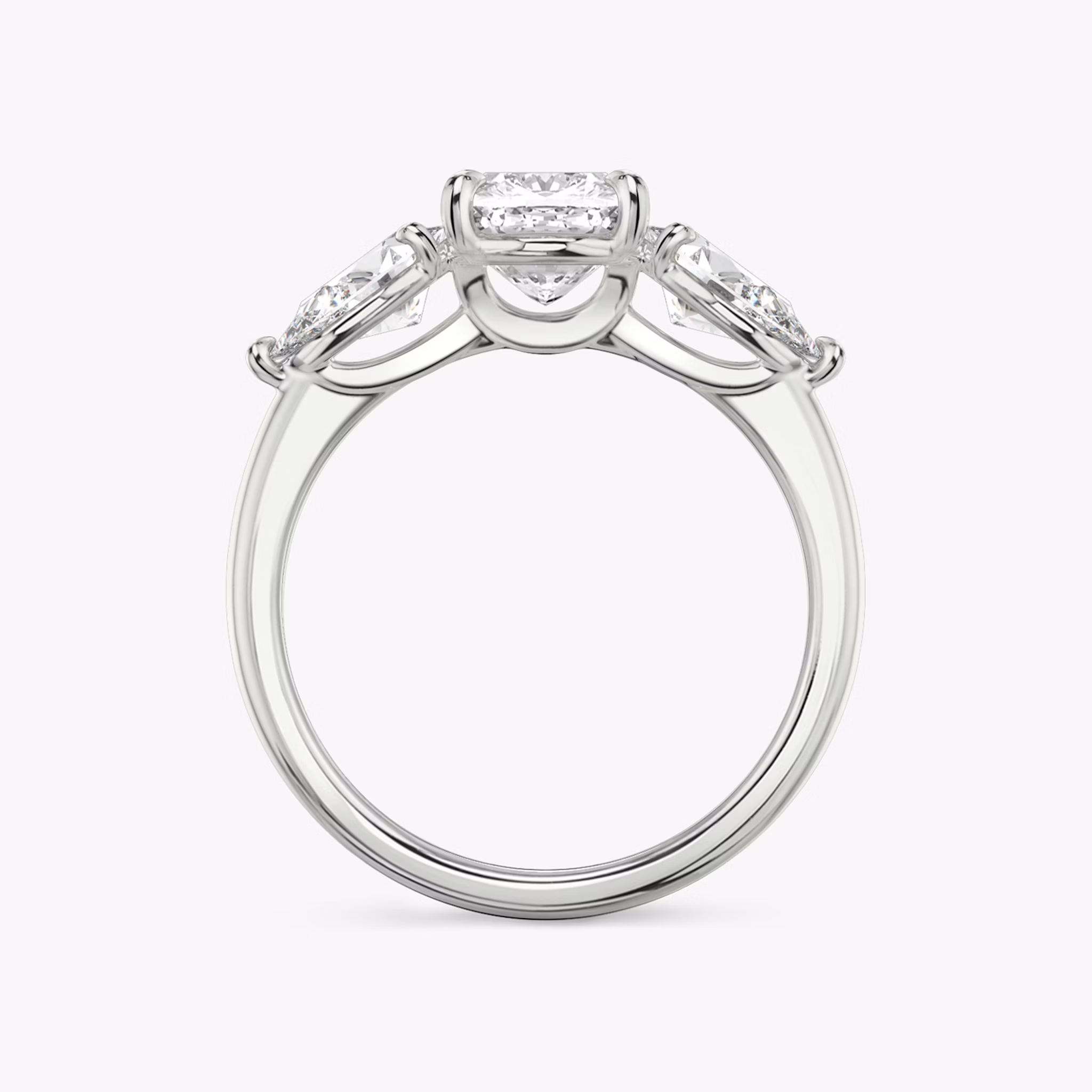 The Three Stone | Cushion | 18k | White Gold | bandAccent: Plain | sideStoneCarat: 0.50ct | sideStoneShape: Pear | diamondOrientation: vertical | caratWeight: other