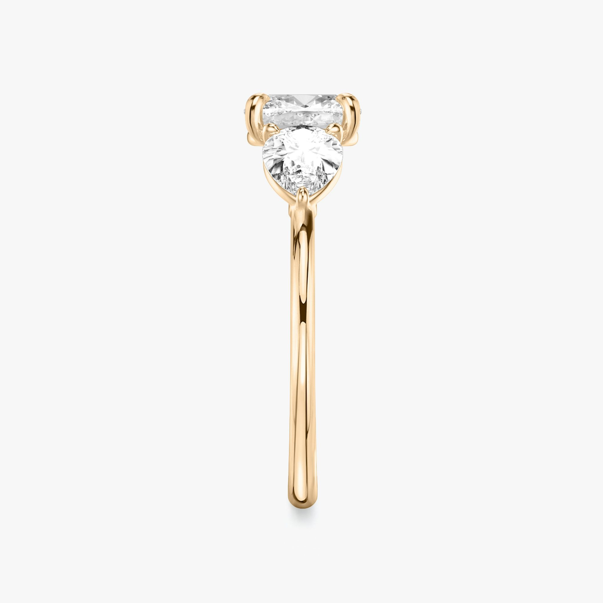 The Three Stone | Cushion | 14k | Rose Gold | bandAccent: Plain | sideStoneCarat: 0.50ct | sideStoneShape: Pear | diamondOrientation: vertical | caratWeight: other