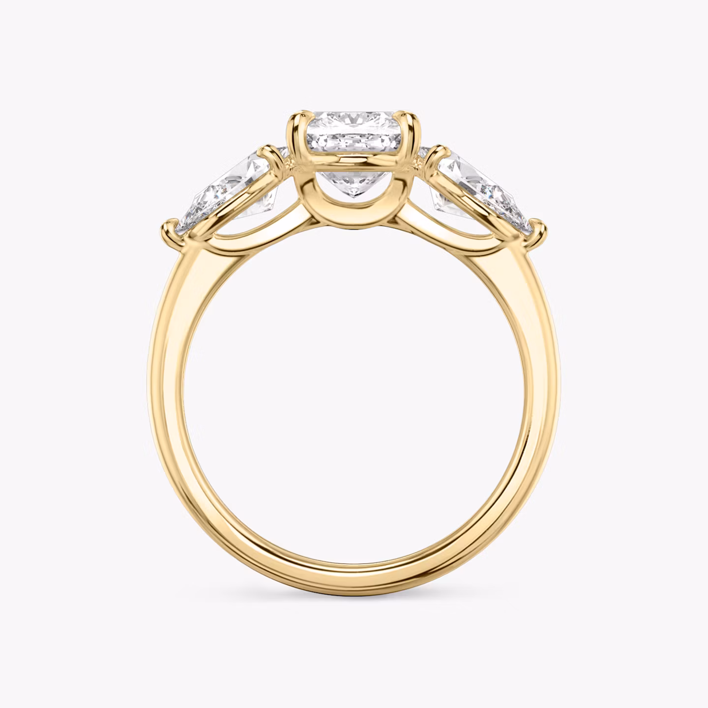 The Three Stone | Cushion | 18k | Yellow Gold | bandAccent: Plain | sideStoneCarat: 0.50ct | sideStoneShape: Pear | diamondOrientation: vertical | caratWeight: other