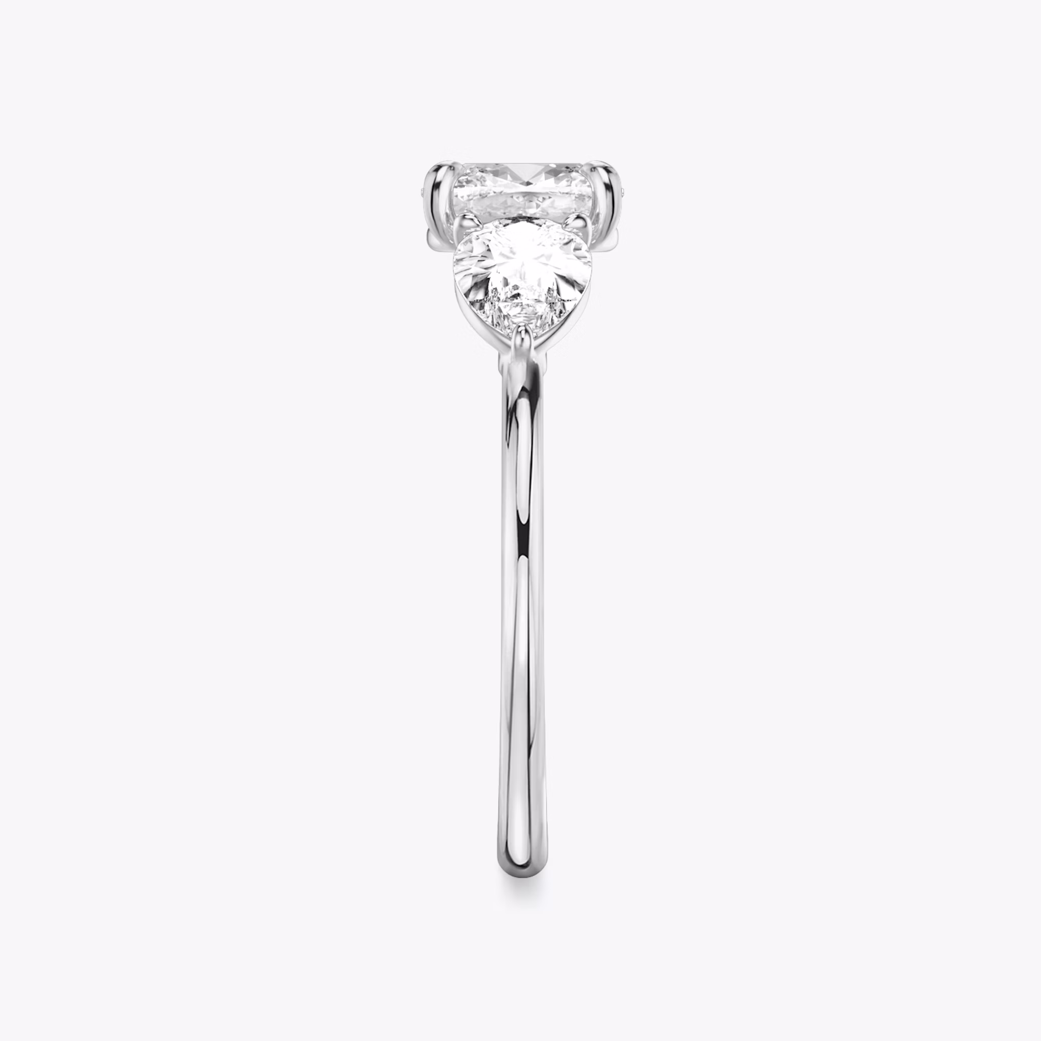 The Three Stone | Cushion | 18k | White Gold | bandAccent: Plain | sideStoneCarat: 0.50ct | sideStoneShape: Pear | diamondOrientation: vertical | caratWeight: other