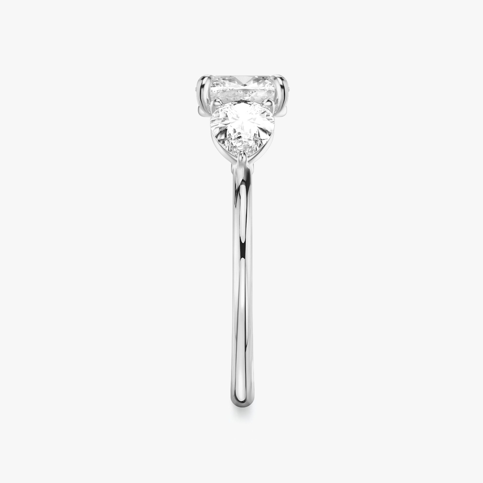 The Three Stone | Cushion | 18k | White Gold | bandAccent: Plain | sideStoneCarat: 0.50ct | sideStoneShape: Pear | diamondOrientation: vertical | caratWeight: other