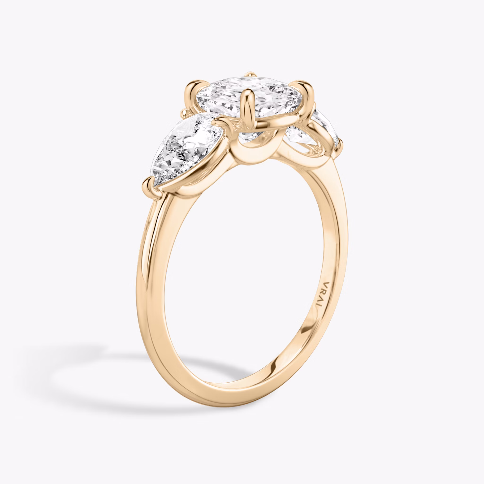 The Three Stone | Cushion | 14k | Rose Gold | bandAccent: Plain | sideStoneCarat: 0.50ct | sideStoneShape: Pear | diamondOrientation: vertical | caratWeight: other