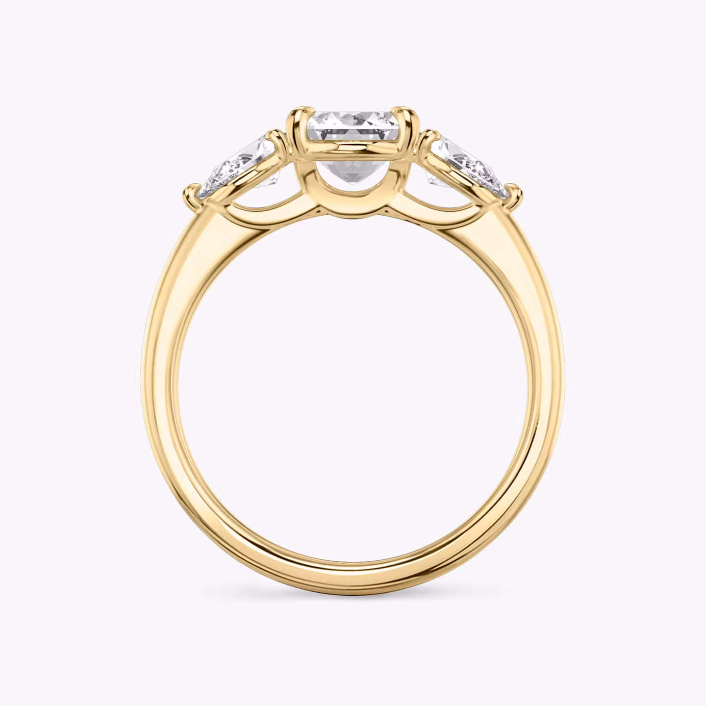 The Three Stone | Emerald | 18k | Yellow Gold | bandAccent: Plain | sideStoneCarat: 0.25ct | sideStoneShape: Pear | diamondOrientation: vertical | caratWeight: other