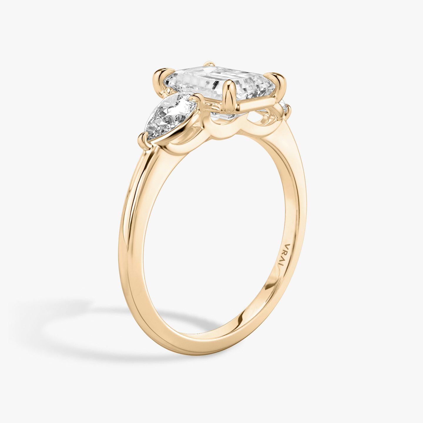 The Three Stone | Emerald | 14k | Rose Gold | bandAccent: Plain | sideStoneCarat: 0.25ct | sideStoneShape: Pear | diamondOrientation: vertical | caratWeight: other
