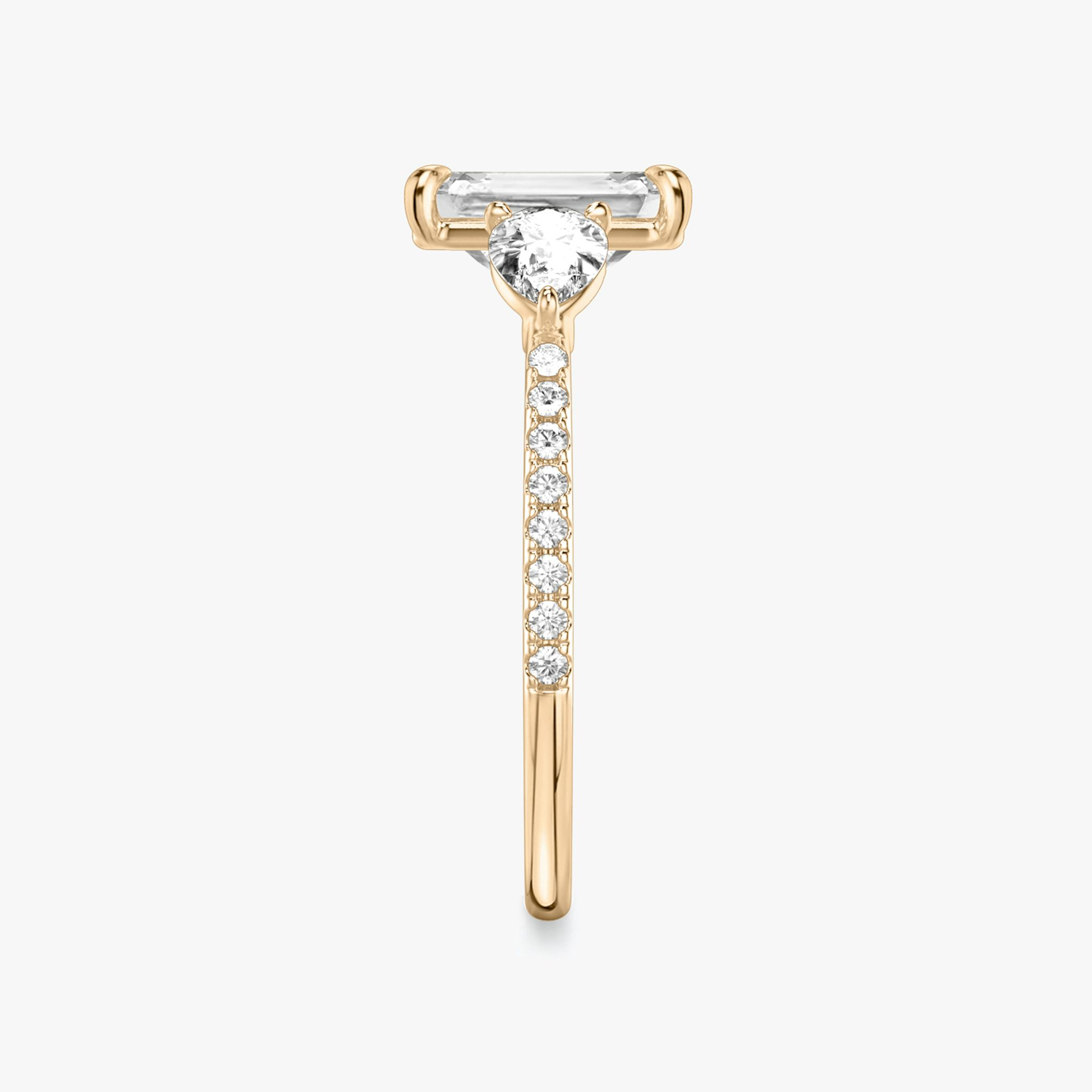 The Three Stone | Emerald | 14k | Rose Gold | bandAccent: Pavé | sideStoneCarat: 0.25ct | sideStoneShape: Pear | diamondOrientation: vertical | caratWeight: other
