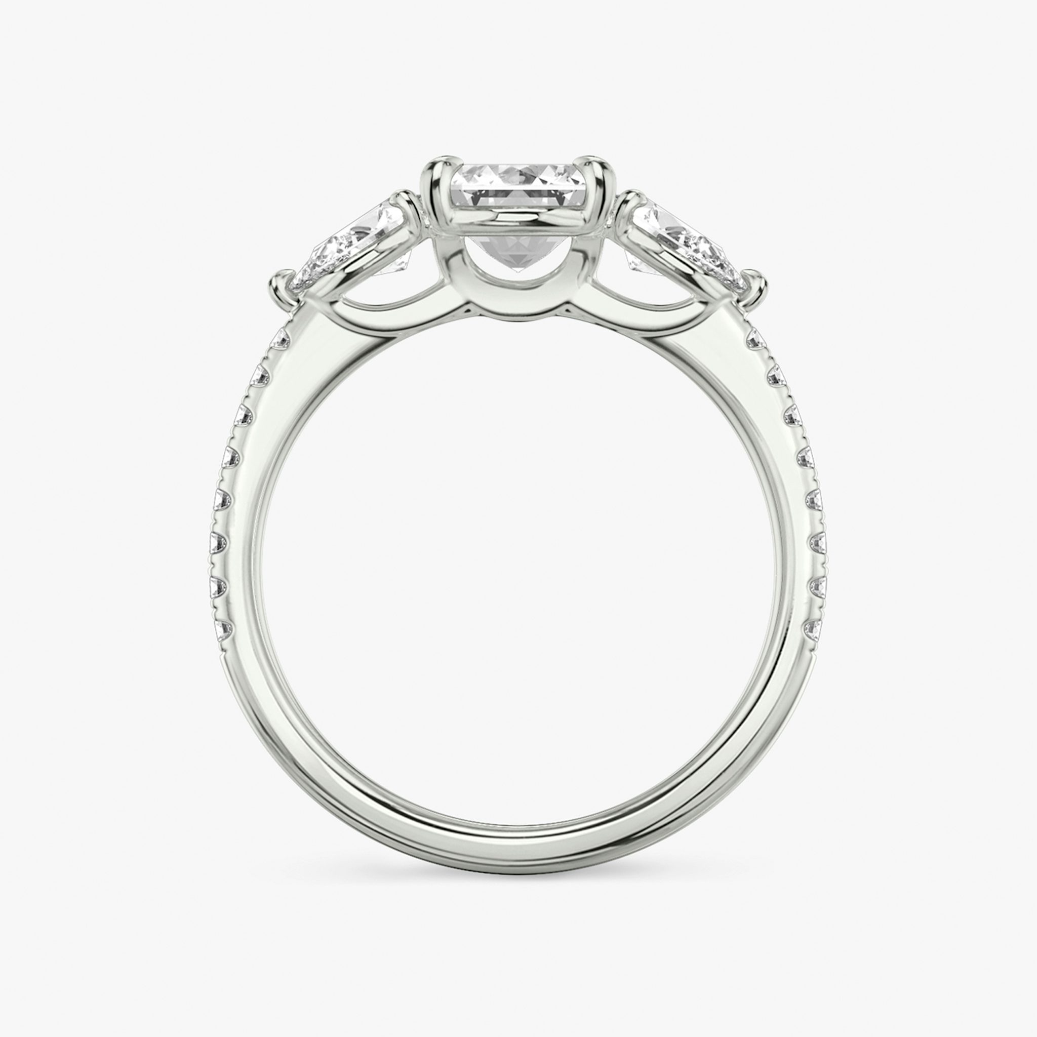 The Three Stone | Emerald | 18k | White Gold | bandAccent: Pavé | sideStoneCarat: 0.25ct | sideStoneShape: Pear | diamondOrientation: vertical | caratWeight: other