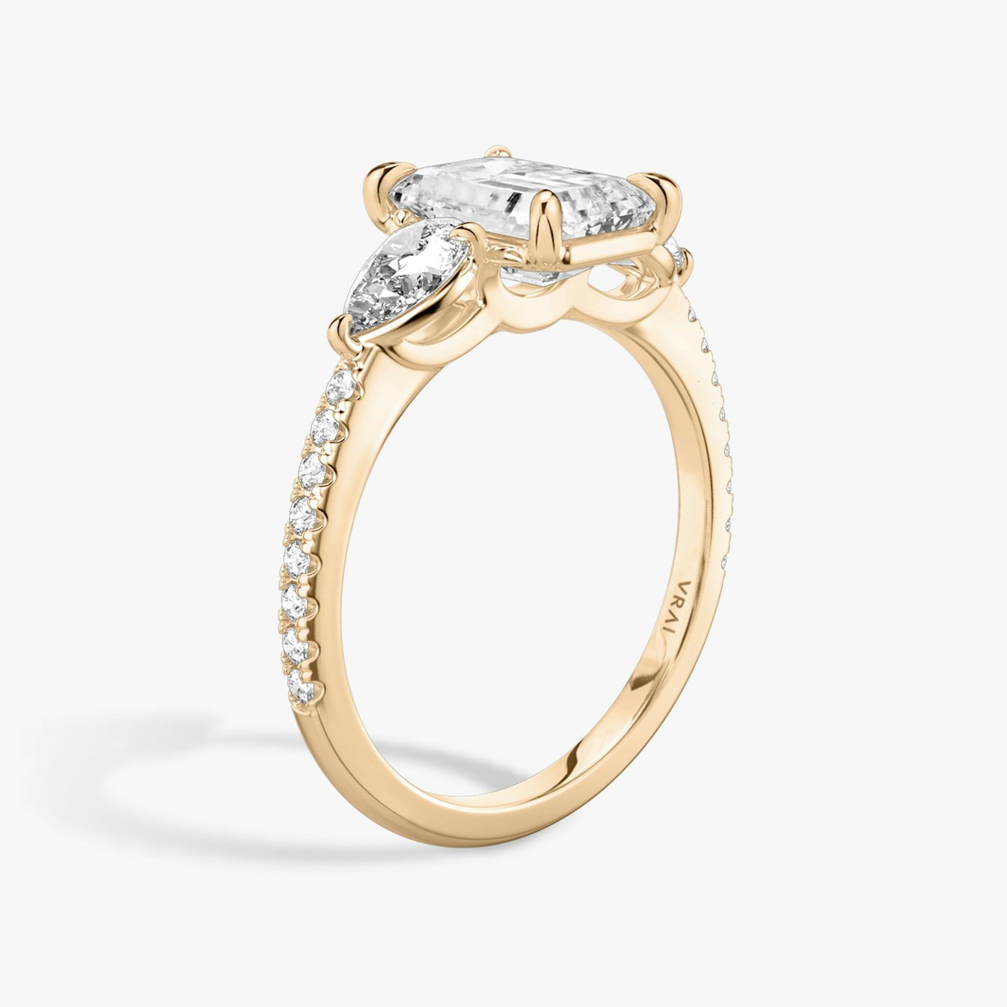 The Three Stone | Emerald | 14k | Rose Gold | bandAccent: Pavé | sideStoneCarat: 0.25ct | sideStoneShape: Pear | diamondOrientation: vertical | caratWeight: other