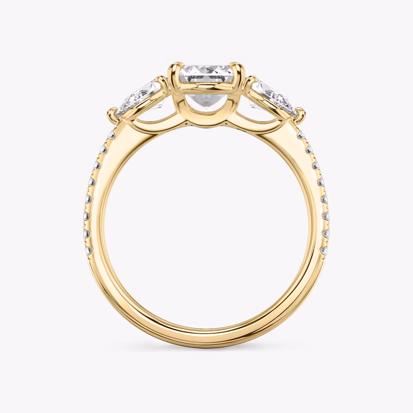 The Three Stone | Emerald | 18k | Yellow Gold | bandAccent: Pavé | sideStoneCarat: 0.25ct | sideStoneShape: Pear | diamondOrientation: vertical | caratWeight: other