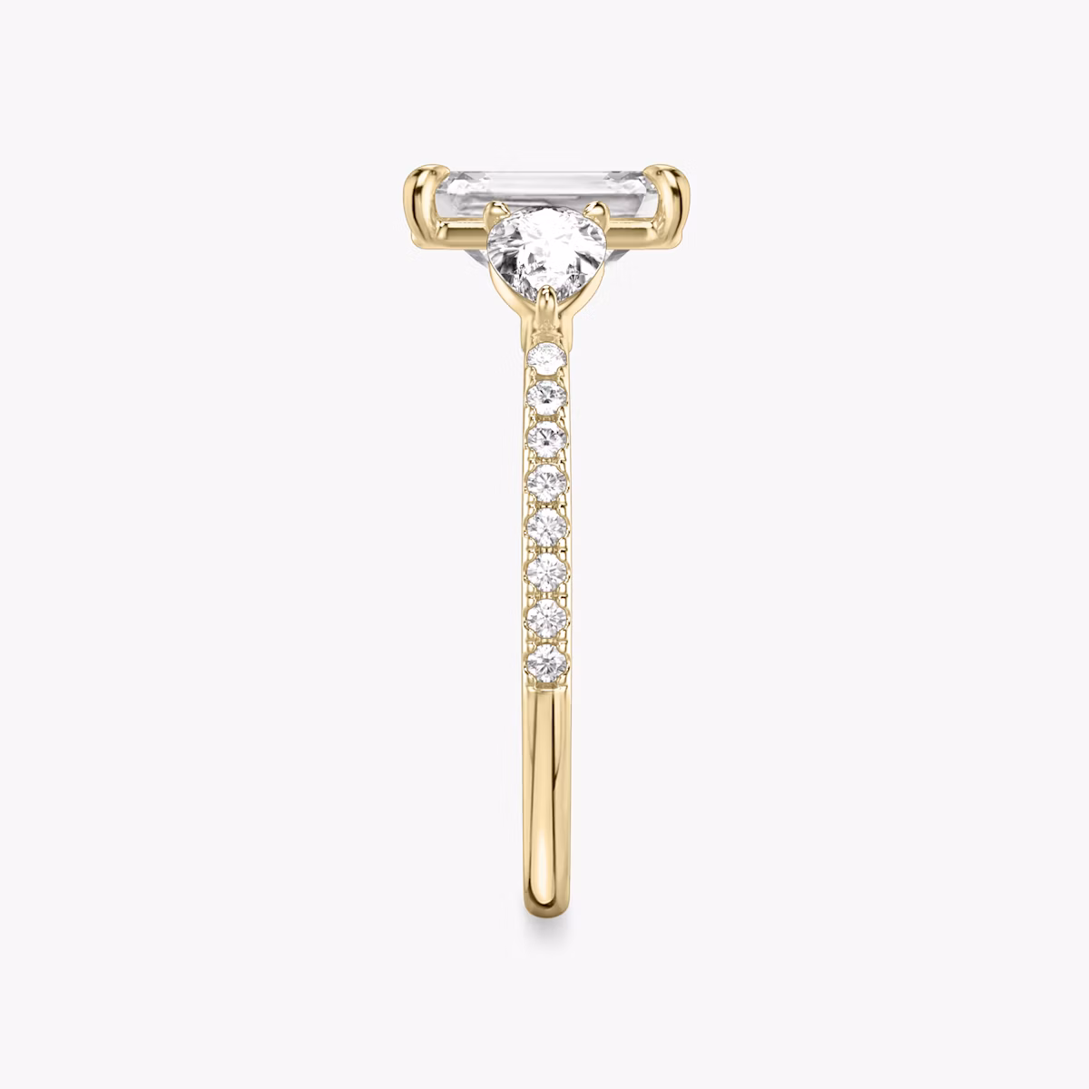 The Three Stone | Emerald | 18k | Yellow Gold | bandAccent: Pavé | sideStoneCarat: 0.25ct | sideStoneShape: Pear | diamondOrientation: vertical | caratWeight: other