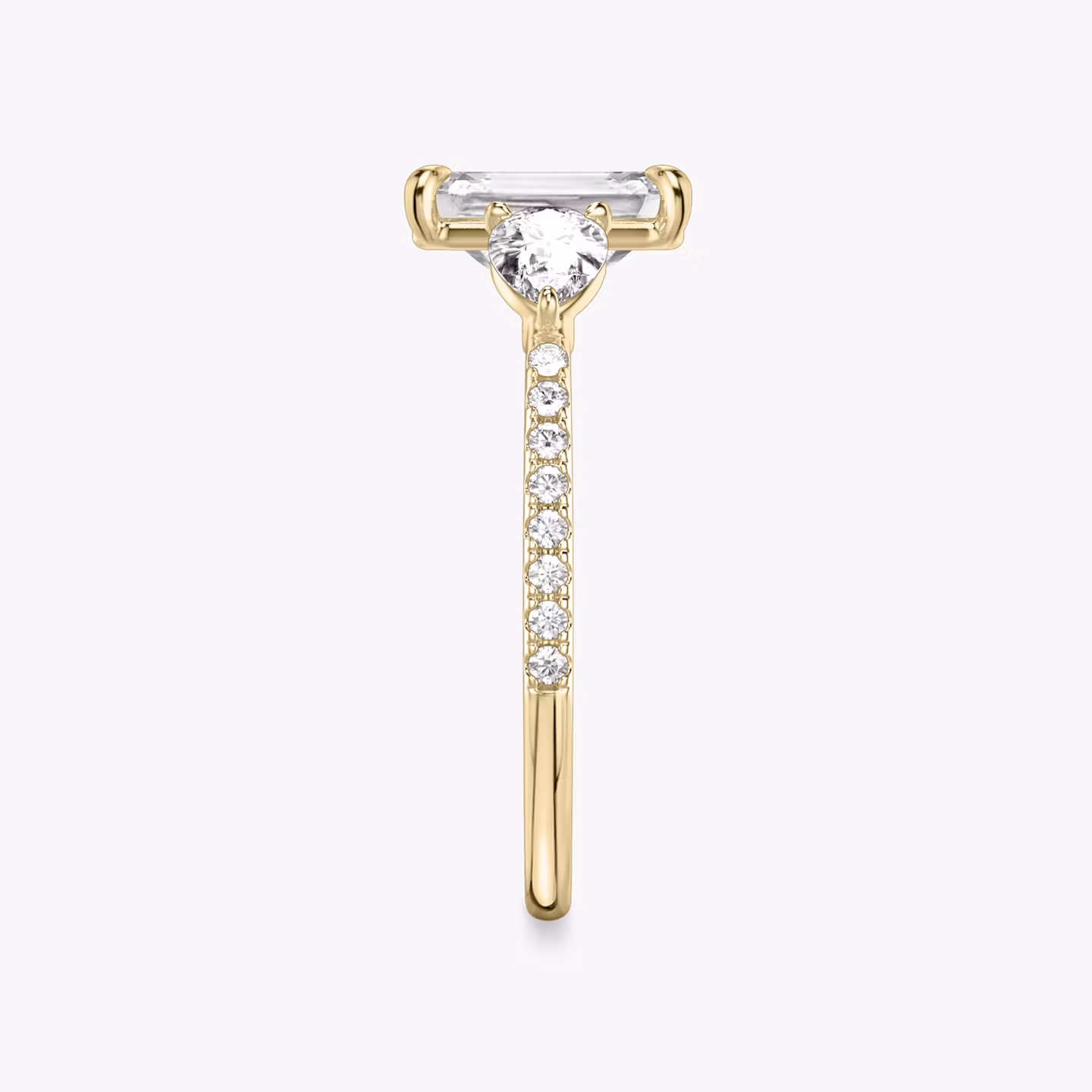 The Three Stone | Emerald | 18k | Yellow Gold | bandAccent: Pavé | sideStoneCarat: 0.25ct | sideStoneShape: Pear | diamondOrientation: vertical | caratWeight: other