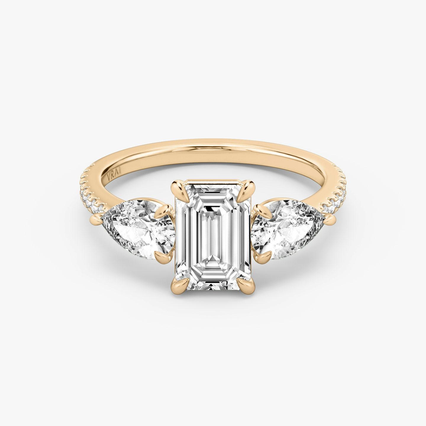 The Three Stone | Emerald | 14k | Rose Gold | bandAccent: Pavé | sideStoneCarat: 0.50ct | sideStoneShape: Pear | diamondOrientation: vertical | caratWeight: other