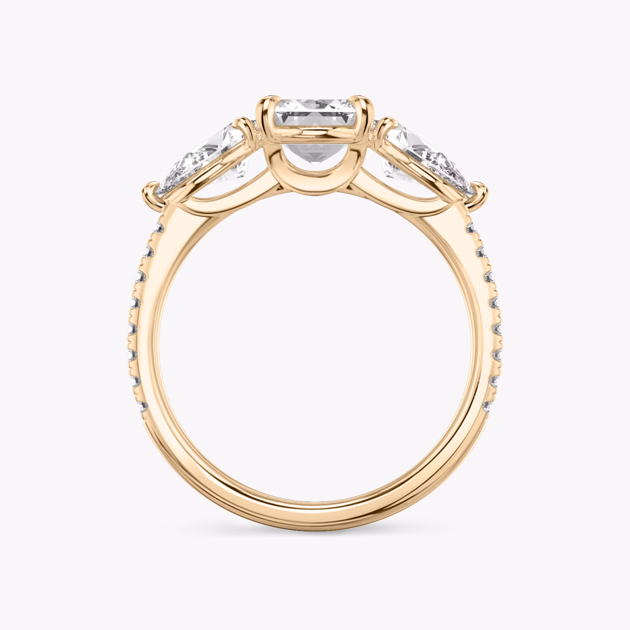 The Three Stone | Emerald | 14k | Rose Gold | bandAccent: Pavé | sideStoneCarat: 0.50ct | sideStoneShape: Pear | diamondOrientation: vertical | caratWeight: other