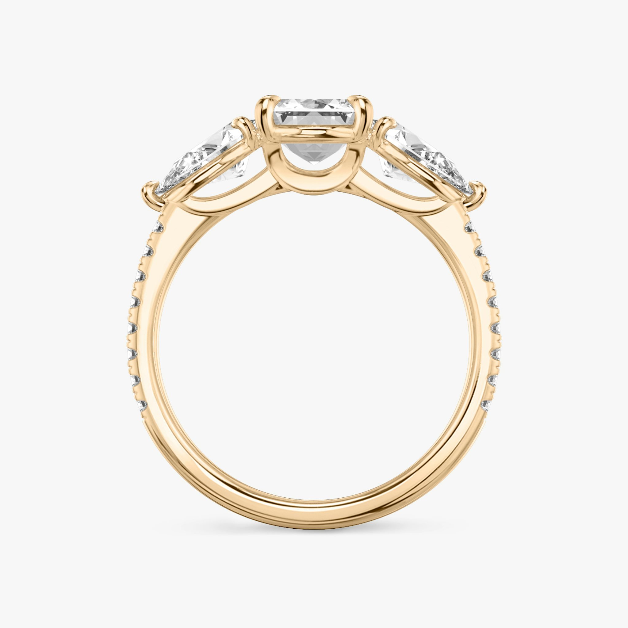 The Three Stone | Emerald | 14k | Rose Gold | bandAccent: Pavé | sideStoneCarat: 0.50ct | sideStoneShape: Pear | diamondOrientation: vertical | caratWeight: other