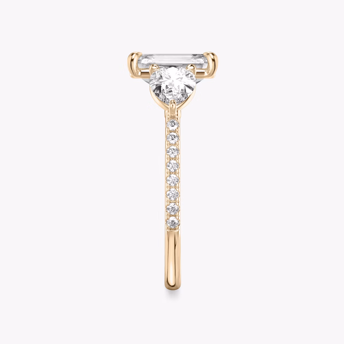 The Three Stone | Emerald | 14k | Rose Gold | bandAccent: Pavé | sideStoneCarat: 0.50ct | sideStoneShape: Pear | diamondOrientation: vertical | caratWeight: other