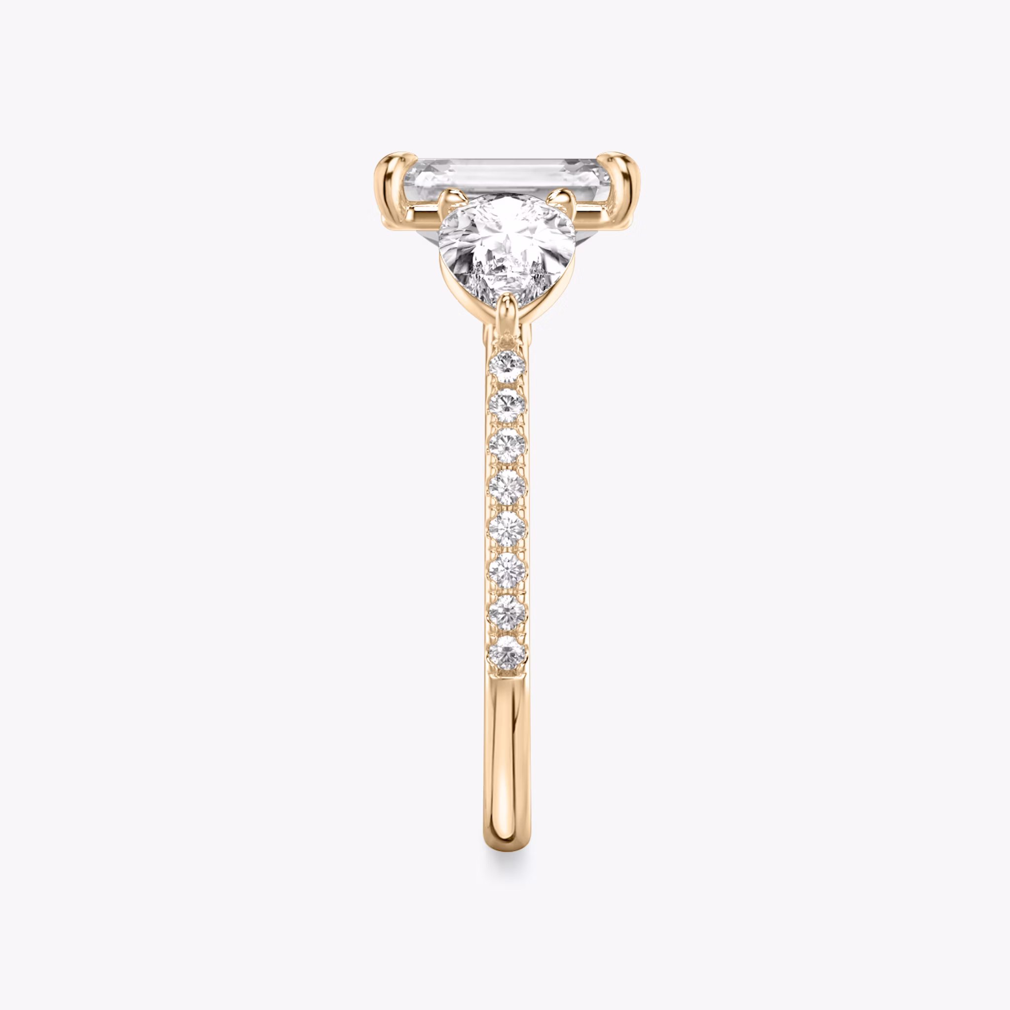 The Three Stone | Emerald | 14k | Rose Gold | bandAccent: Pavé | sideStoneCarat: 0.50ct | sideStoneShape: Pear | diamondOrientation: vertical | caratWeight: other