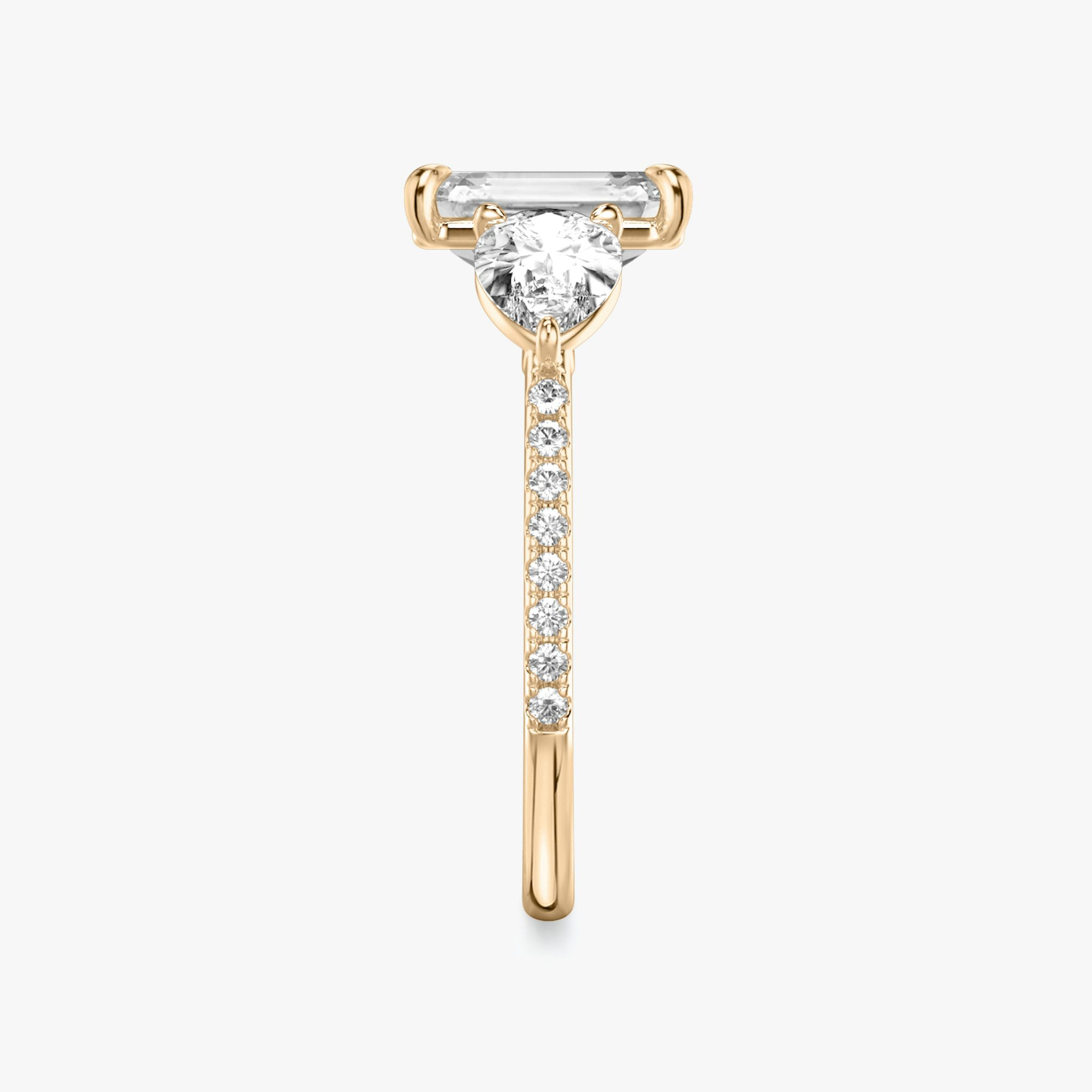 The Three Stone | Emerald | 14k | Rose Gold | bandAccent: Pavé | sideStoneCarat: 0.50ct | sideStoneShape: Pear | diamondOrientation: vertical | caratWeight: other