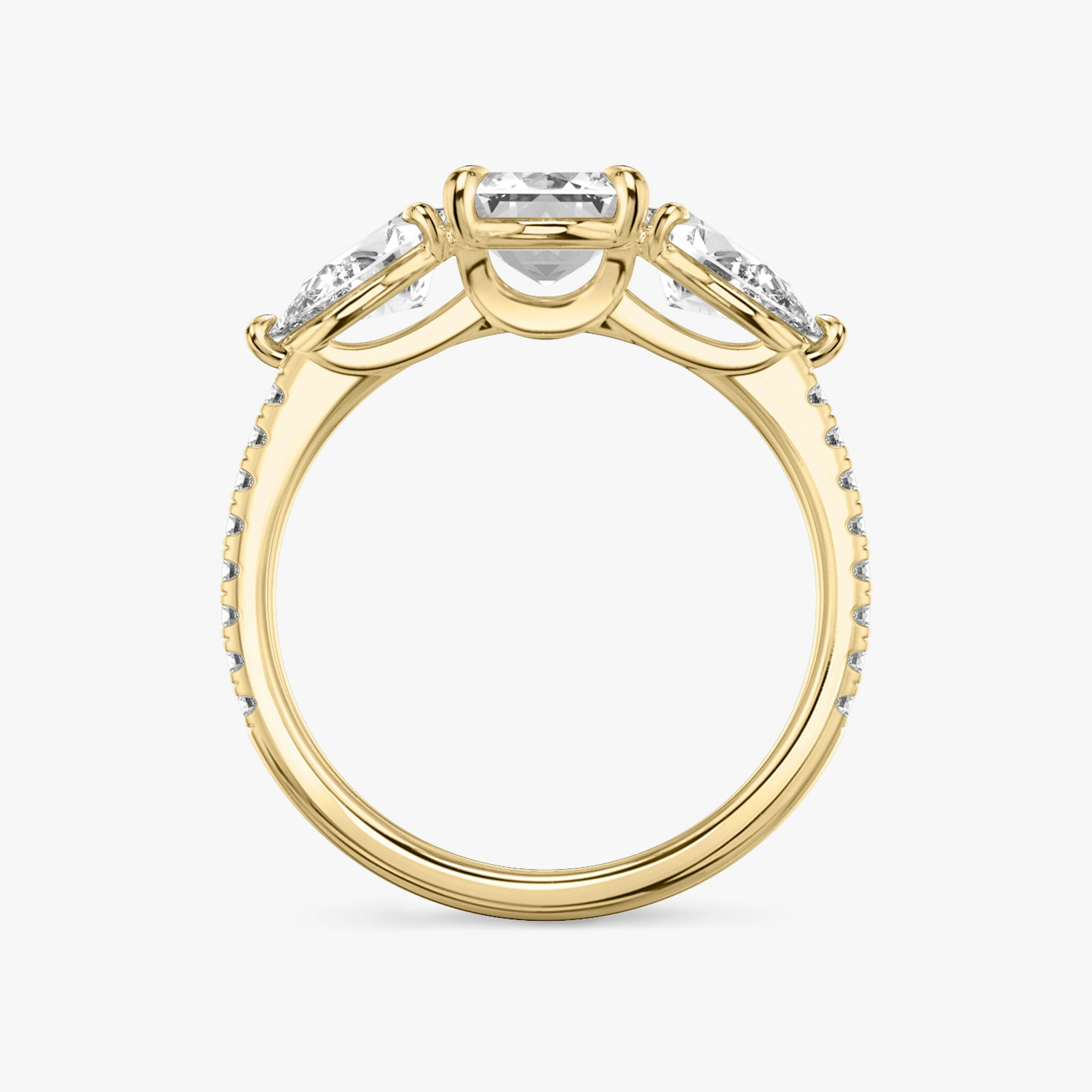 The Three Stone | Emerald | 18k | Yellow Gold | bandAccent: Pavé | sideStoneCarat: 0.50ct | sideStoneShape: Pear | diamondOrientation: vertical | caratWeight: other