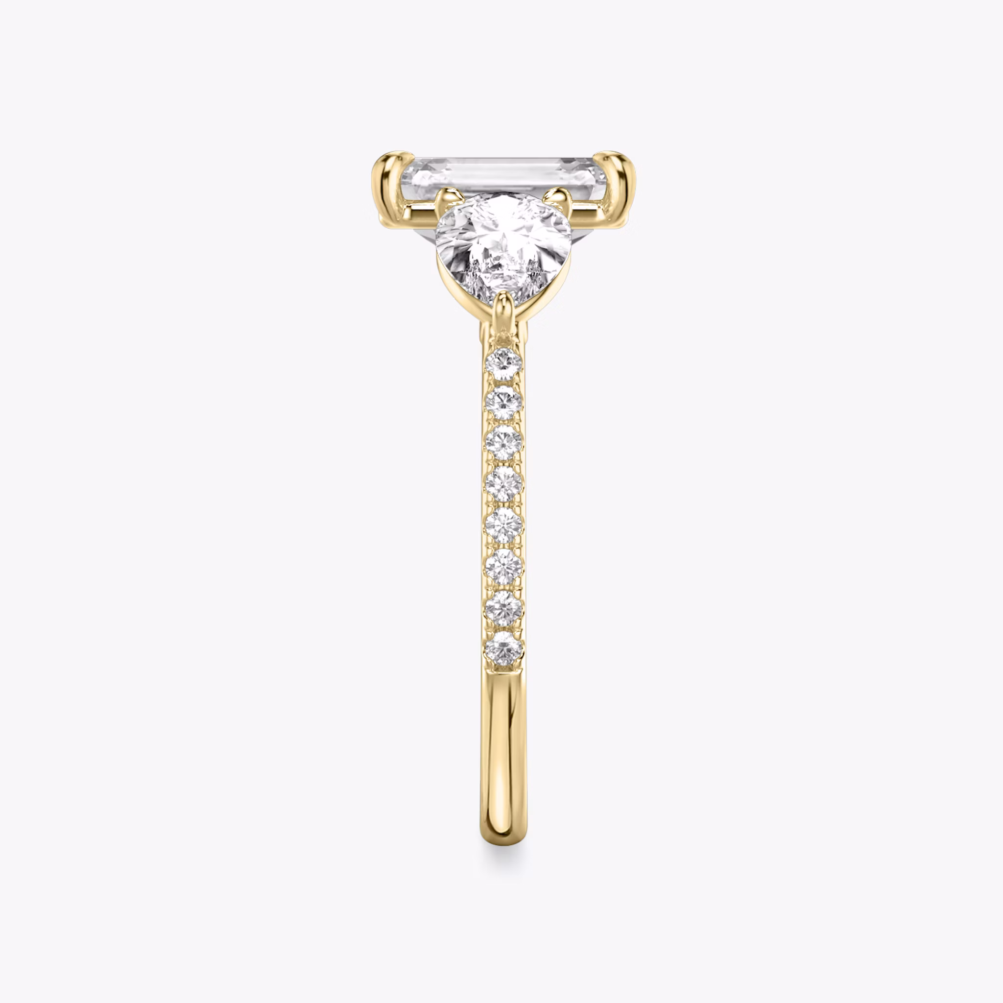 The Three Stone | Emerald | 18k | Yellow Gold | bandAccent: Pavé | sideStoneCarat: 0.50ct | sideStoneShape: Pear | diamondOrientation: vertical | caratWeight: other