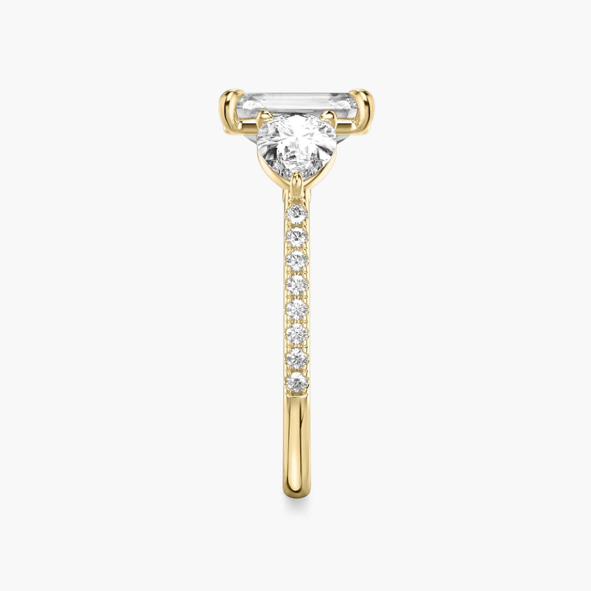 The Three Stone | Emerald | 18k | Yellow Gold | bandAccent: Pavé | sideStoneCarat: 0.50ct | sideStoneShape: Pear | diamondOrientation: vertical | caratWeight: other