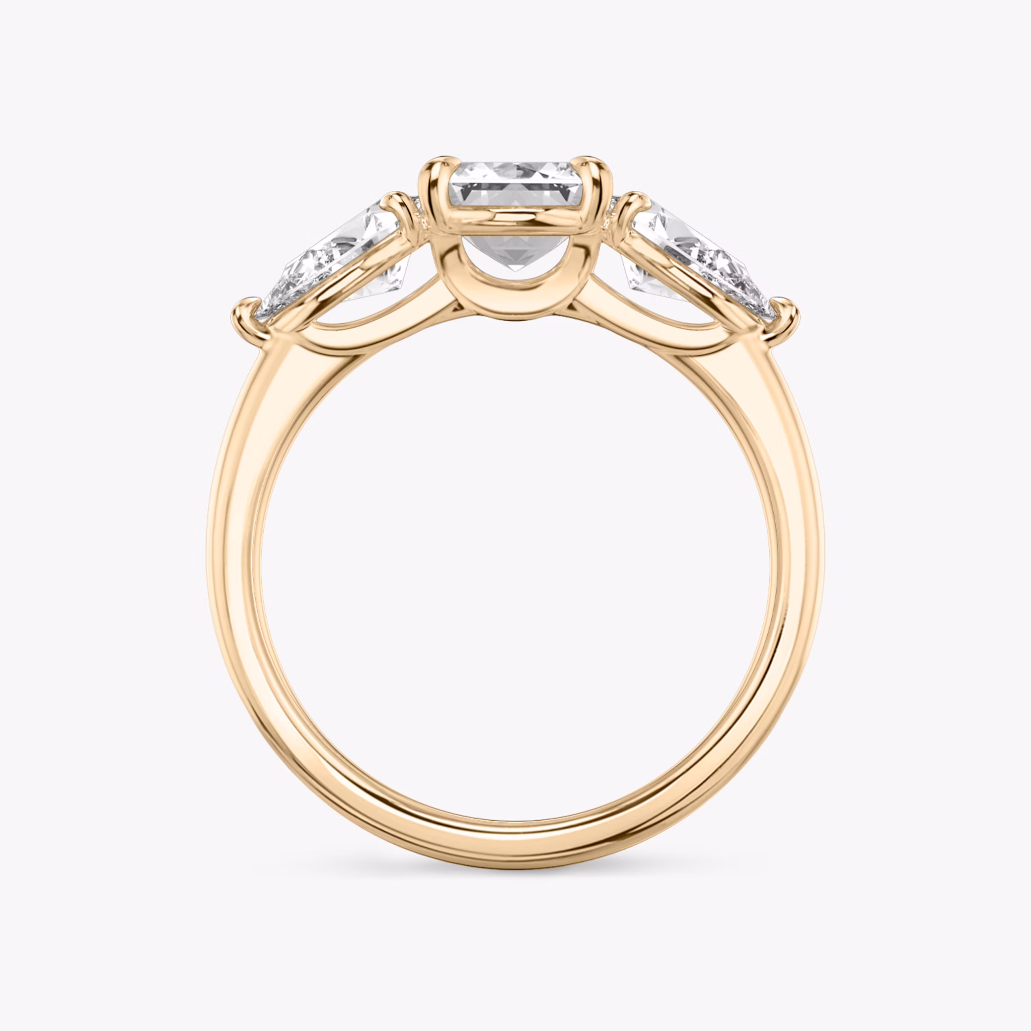 The Three Stone | Emerald | 14k | Rose Gold | bandAccent: Plain | sideStoneCarat: 0.50ct | sideStoneShape: Pear | diamondOrientation: vertical | caratWeight: other