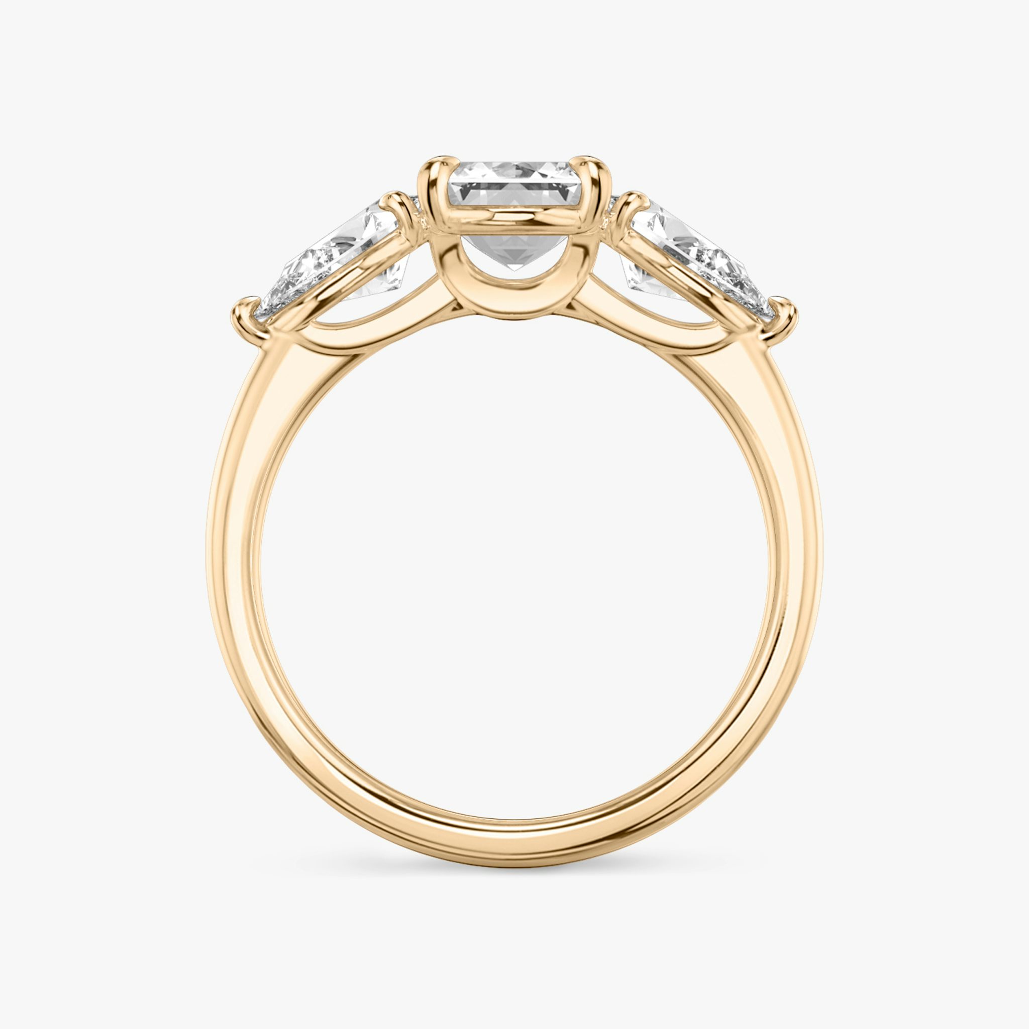 The Three Stone | Emerald | 14k | Rose Gold | bandAccent: Plain | sideStoneCarat: 0.50ct | sideStoneShape: Pear | diamondOrientation: vertical | caratWeight: other