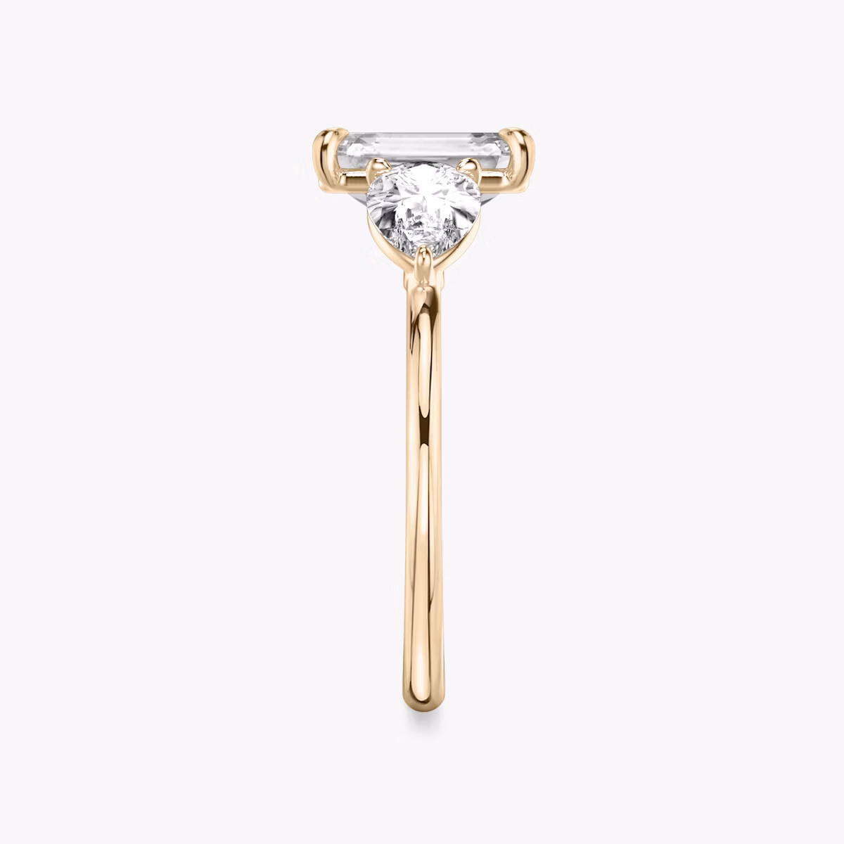 The Three Stone | Emerald | 14k | Rose Gold | bandAccent: Plain | sideStoneCarat: 0.50ct | sideStoneShape: Pear | diamondOrientation: vertical | caratWeight: other