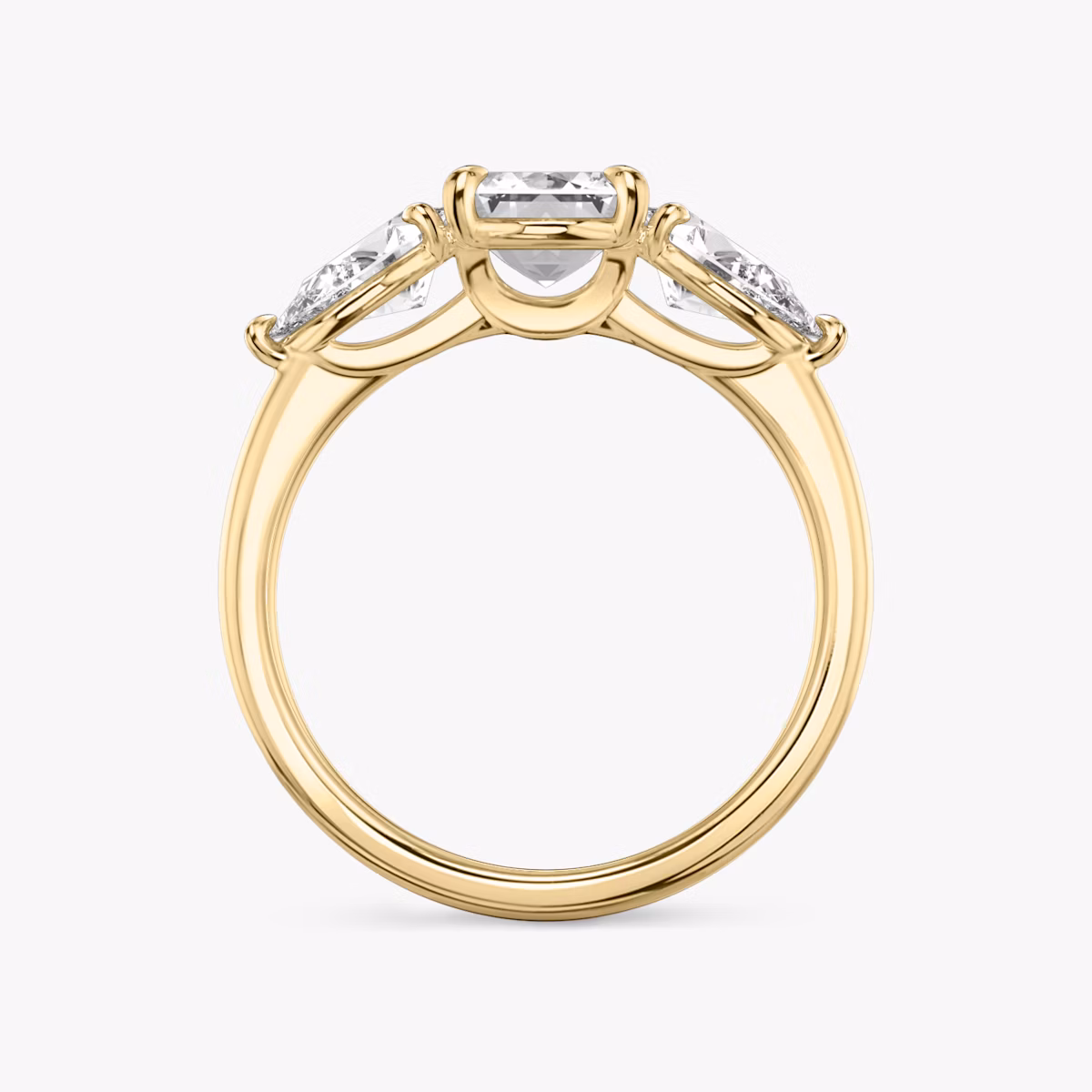 The Three Stone | Emerald | 18k | Yellow Gold | bandAccent: Plain | sideStoneCarat: 0.50ct | sideStoneShape: Pear | diamondOrientation: vertical | caratWeight: other