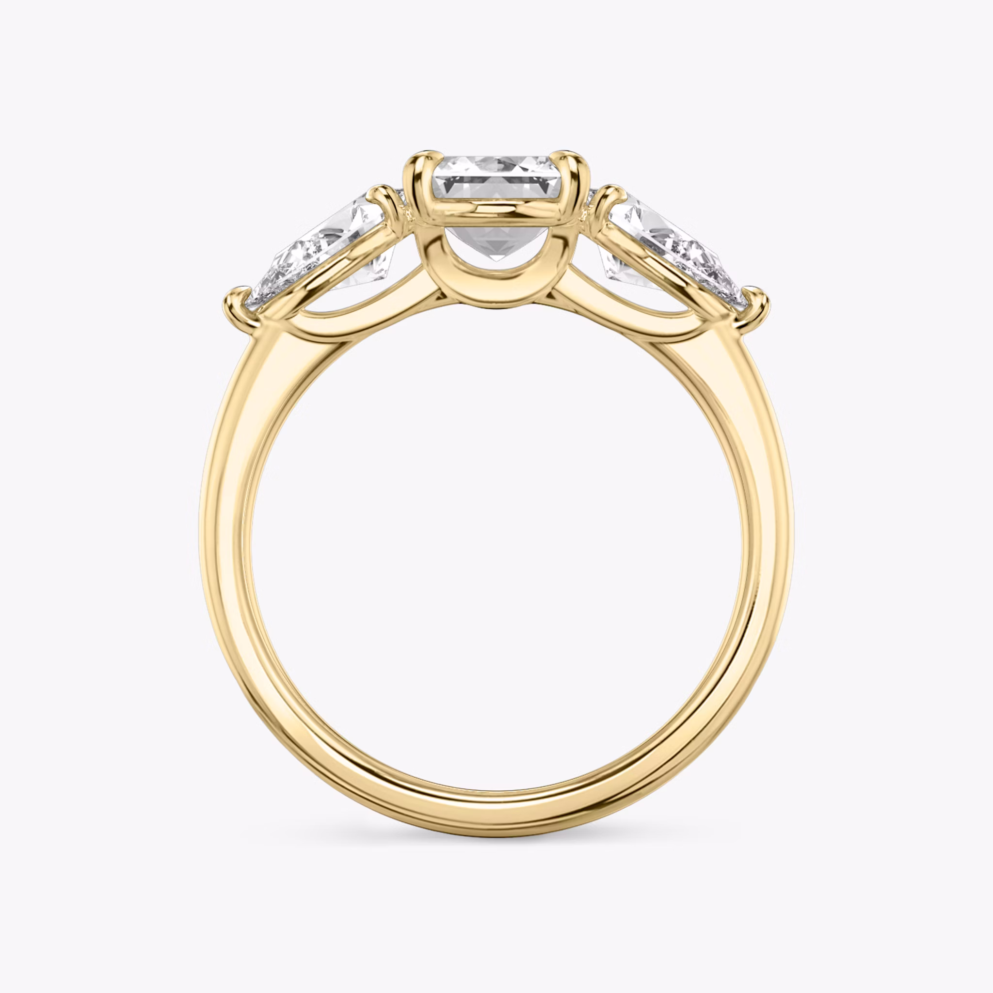 The Three Stone | Emerald | 18k | Yellow Gold | bandAccent: Plain | sideStoneCarat: 0.50ct | sideStoneShape: Pear | diamondOrientation: vertical | caratWeight: other