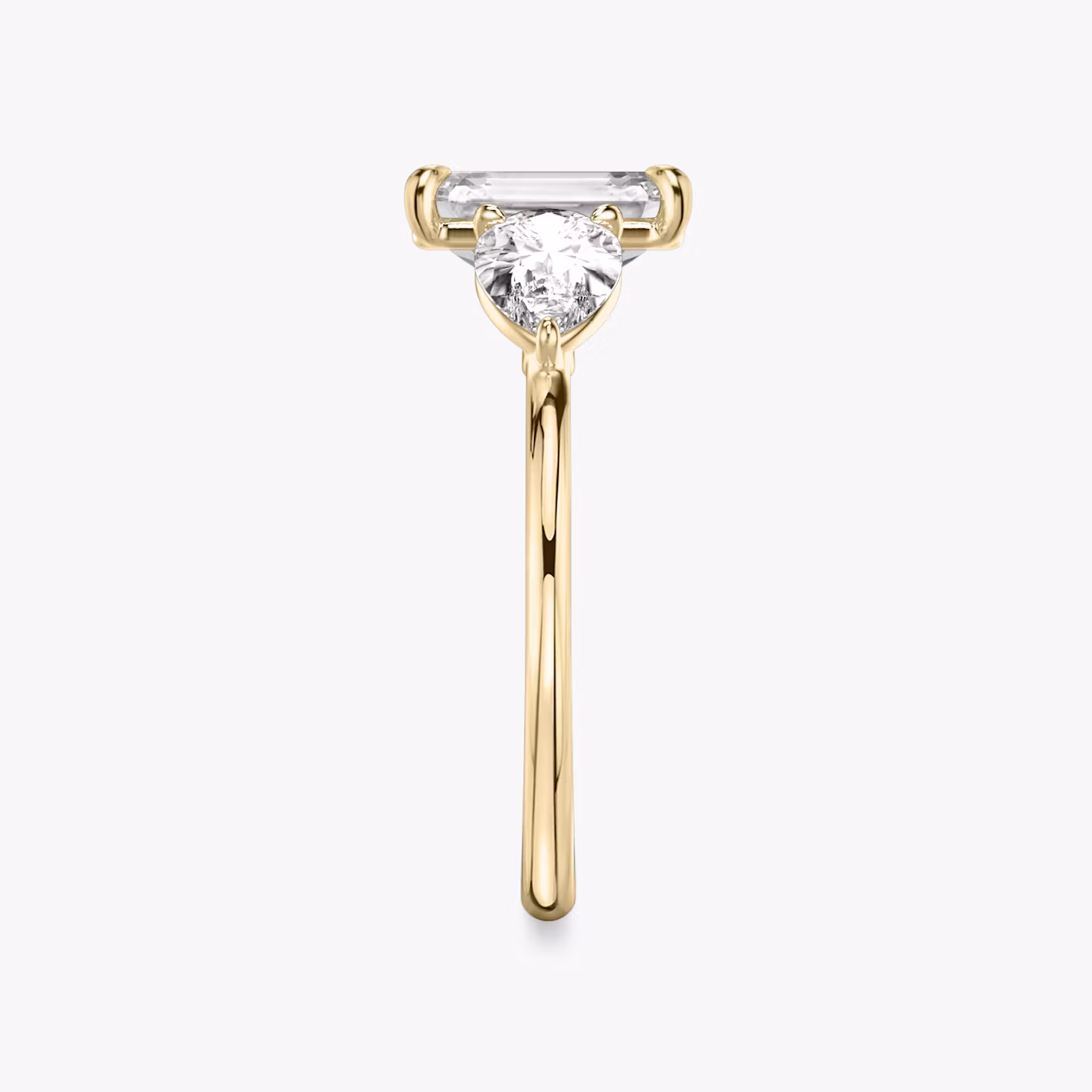 The Three Stone | Emerald | 18k | Yellow Gold | bandAccent: Plain | sideStoneCarat: 0.50ct | sideStoneShape: Pear | diamondOrientation: vertical | caratWeight: other