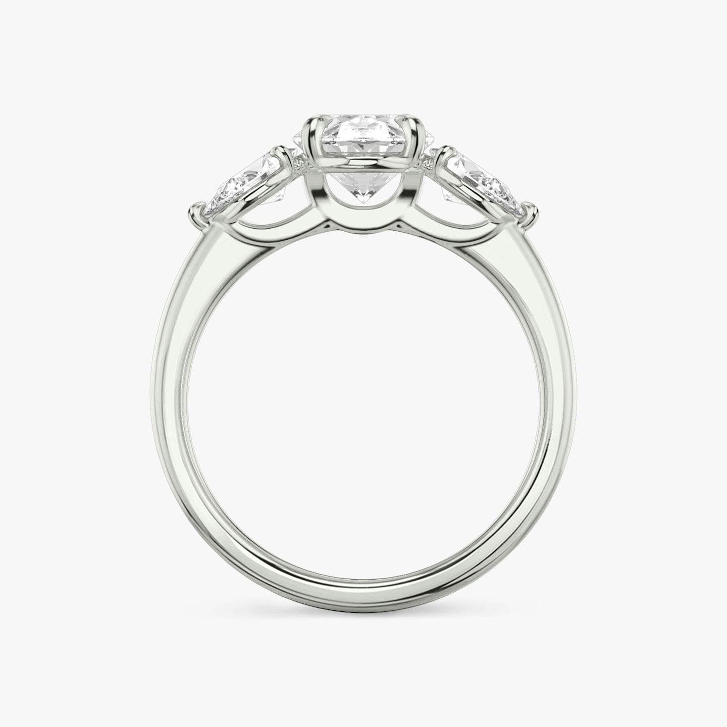 The Three Stone | Oval | Platinum | bandAccent: Plain | sideStoneCarat: 0.25ct | sideStoneShape: Pear | diamondOrientation: vertical | caratWeight: other