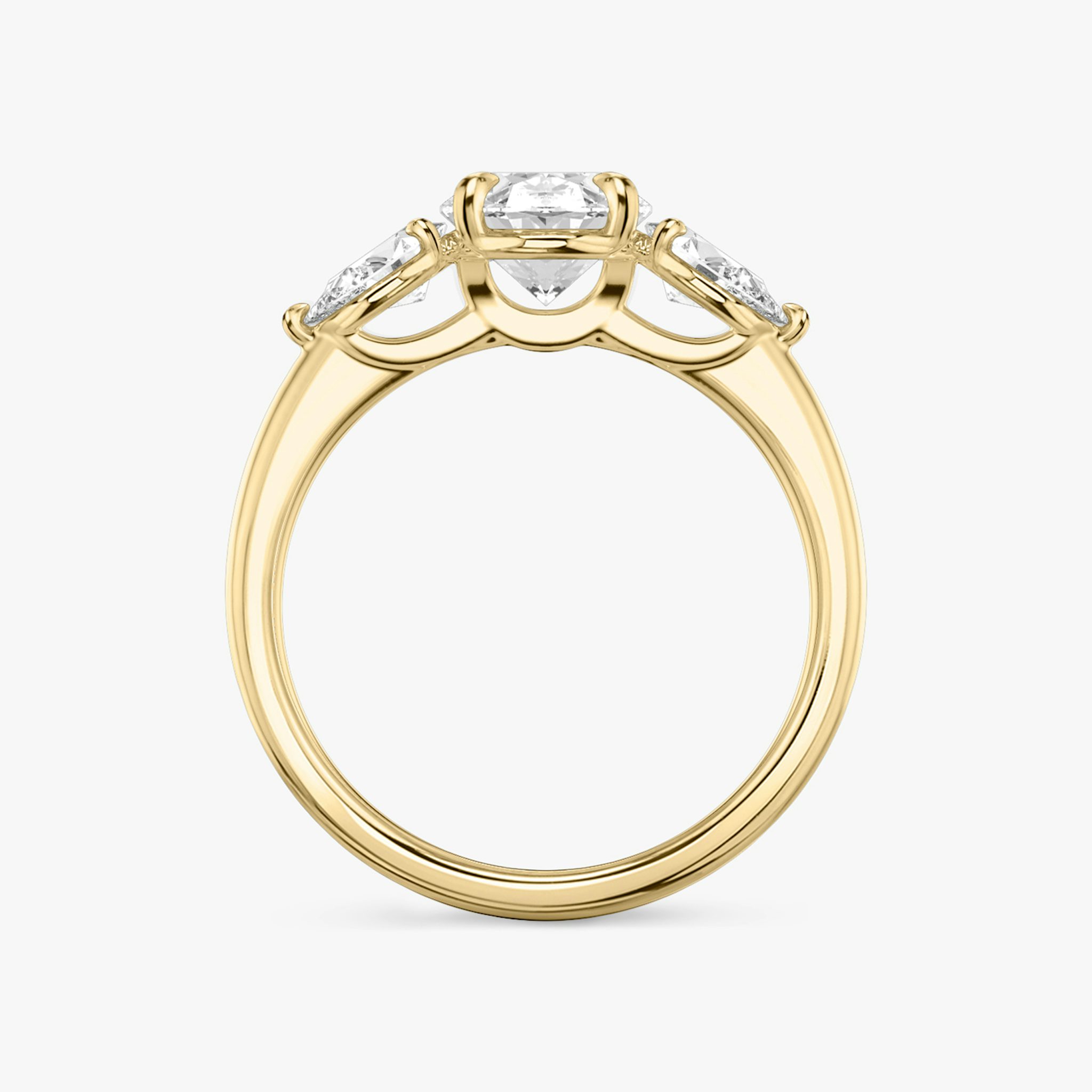 The Three Stone | Oval | 18k | Yellow Gold | bandAccent: Plain | sideStoneCarat: 0.25ct | sideStoneShape: Pear | diamondOrientation: vertical | caratWeight: other