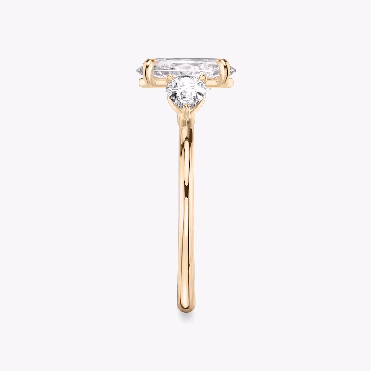 The Three Stone | Oval | 14k | Rose Gold | bandAccent: Plain | sideStoneCarat: 0.25ct | sideStoneShape: Pear | diamondOrientation: vertical | caratWeight: other
