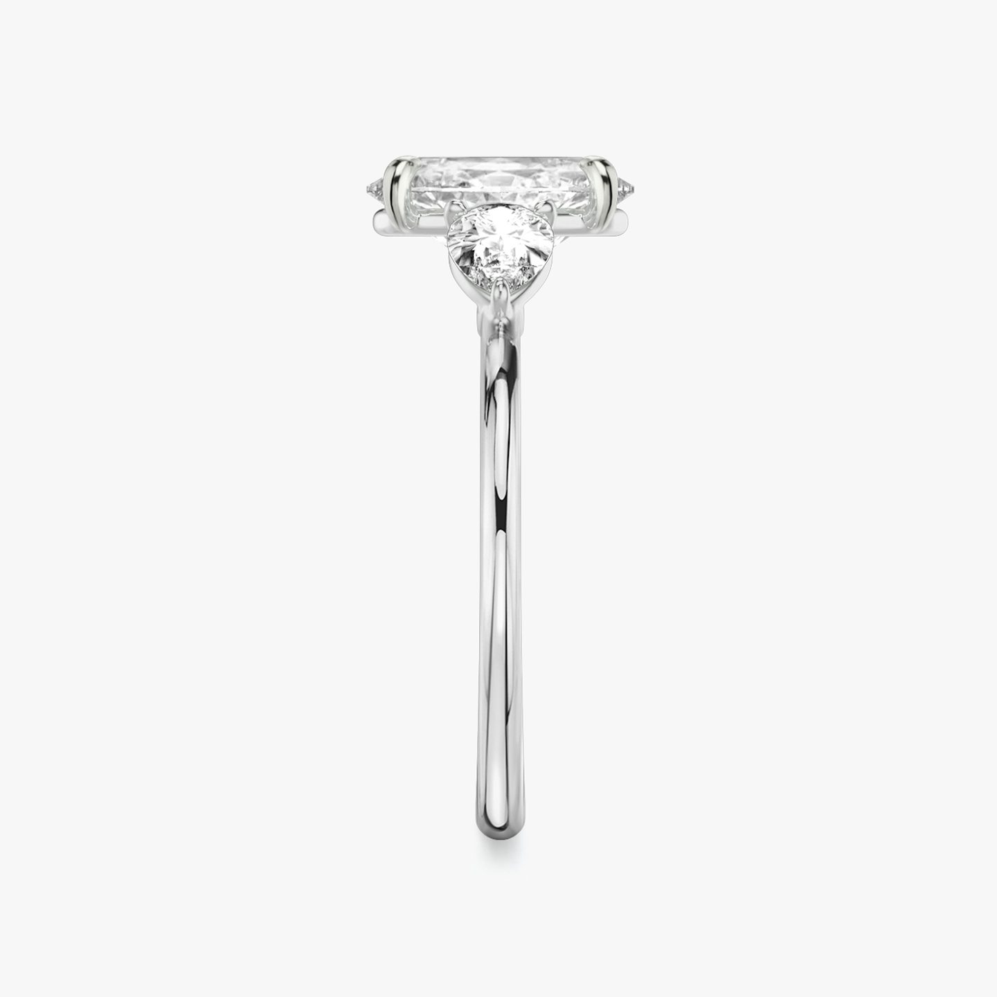 The Three Stone | Oval | Platinum | bandAccent: Plain | sideStoneCarat: 0.25ct | sideStoneShape: Pear | diamondOrientation: vertical | caratWeight: other