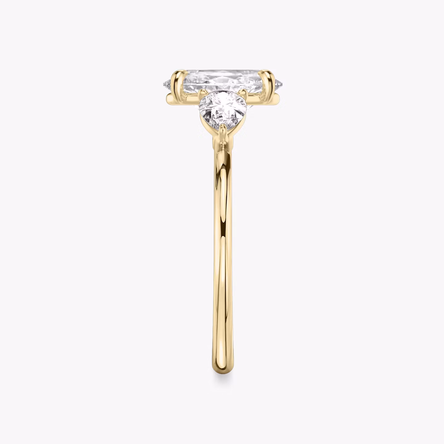 The Three Stone | Oval | 18k | Yellow Gold | bandAccent: Plain | sideStoneCarat: 0.25ct | sideStoneShape: Pear | diamondOrientation: vertical | caratWeight: other