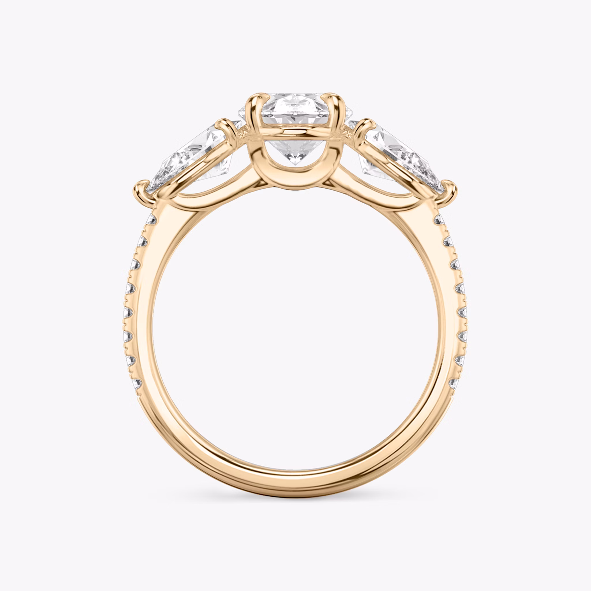The Three Stone | Oval | 14k | Rose Gold | bandAccent: Pavé | sideStoneCarat: 0.50ct | sideStoneShape: Pear | diamondOrientation: vertical | caratWeight: other