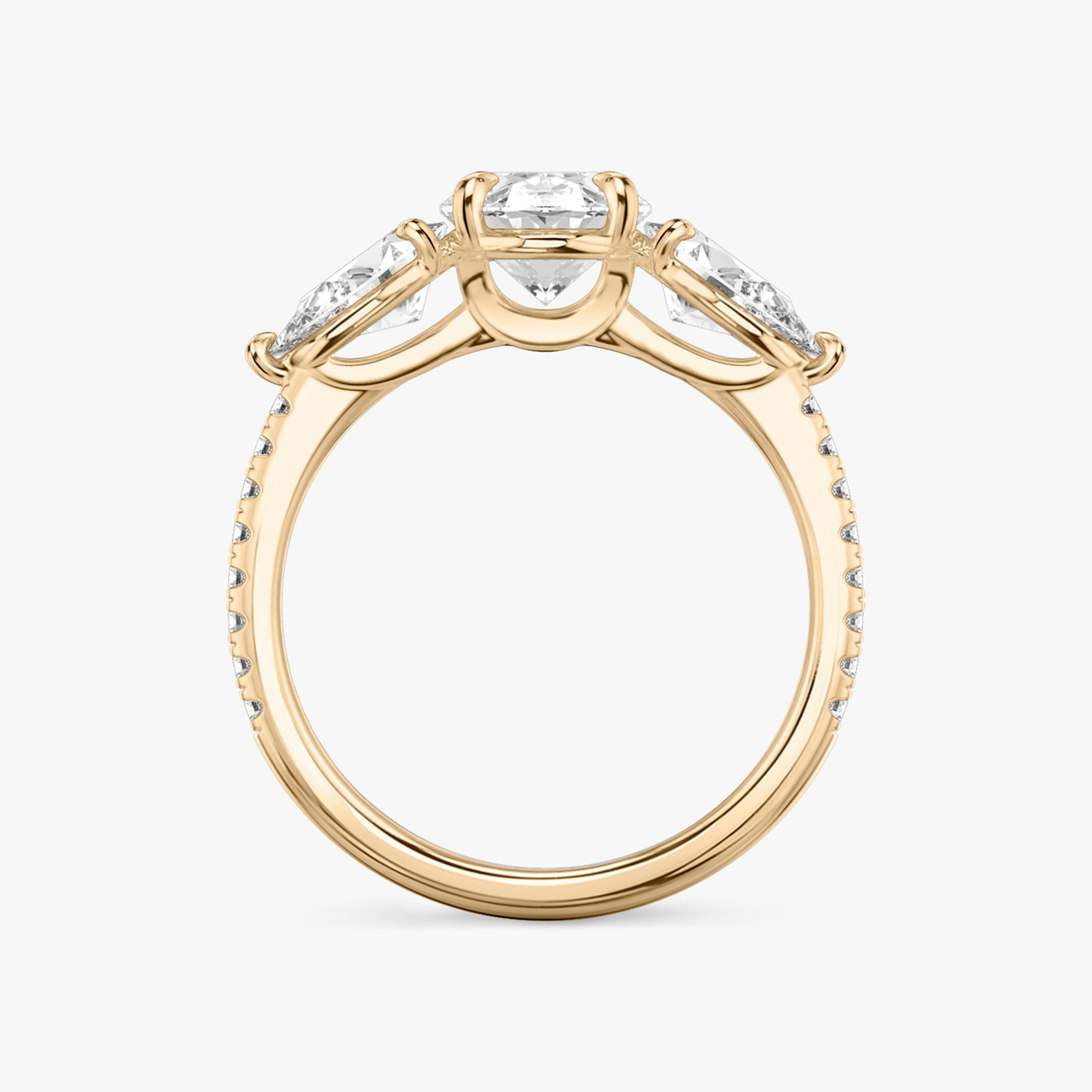 The Three Stone | Oval | 14k | Rose Gold | bandAccent: Pavé | sideStoneCarat: 0.50ct | sideStoneShape: Pear | diamondOrientation: vertical | caratWeight: other