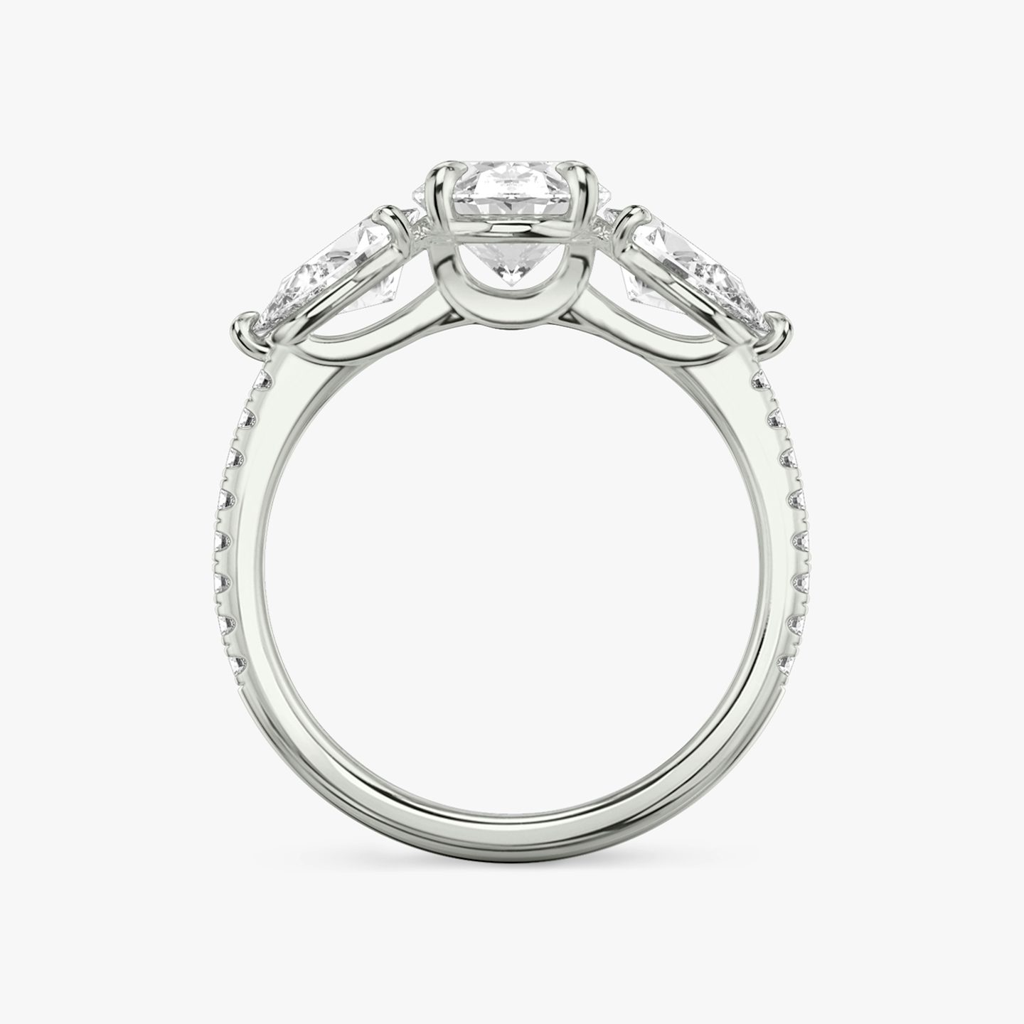 The Three Stone | Oval | Platinum | bandAccent: Pavé | sideStoneCarat: 0.50ct | sideStoneShape: Pear | diamondOrientation: vertical | caratWeight: other