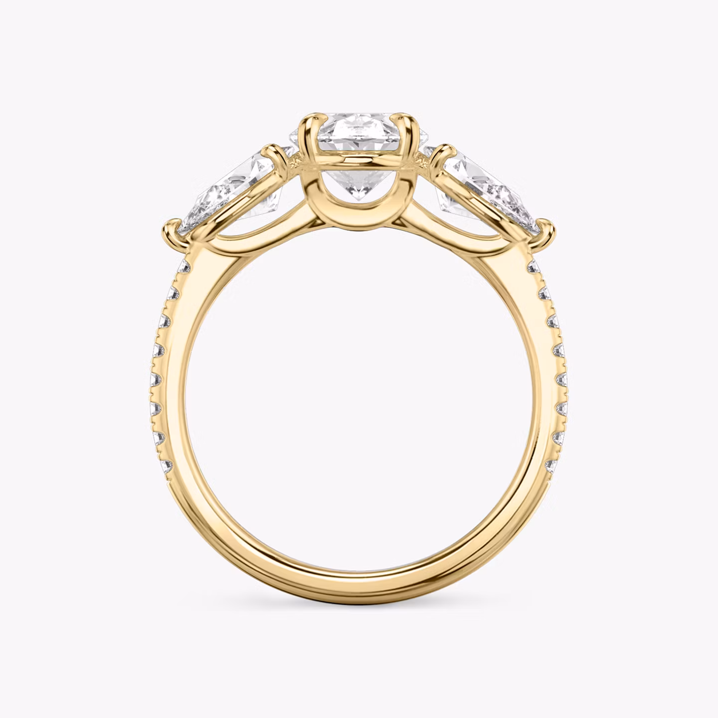 The Three Stone | Oval | 18k | Yellow Gold | bandAccent: Pavé | sideStoneCarat: 0.50ct | sideStoneShape: Pear | diamondOrientation: vertical | caratWeight: other