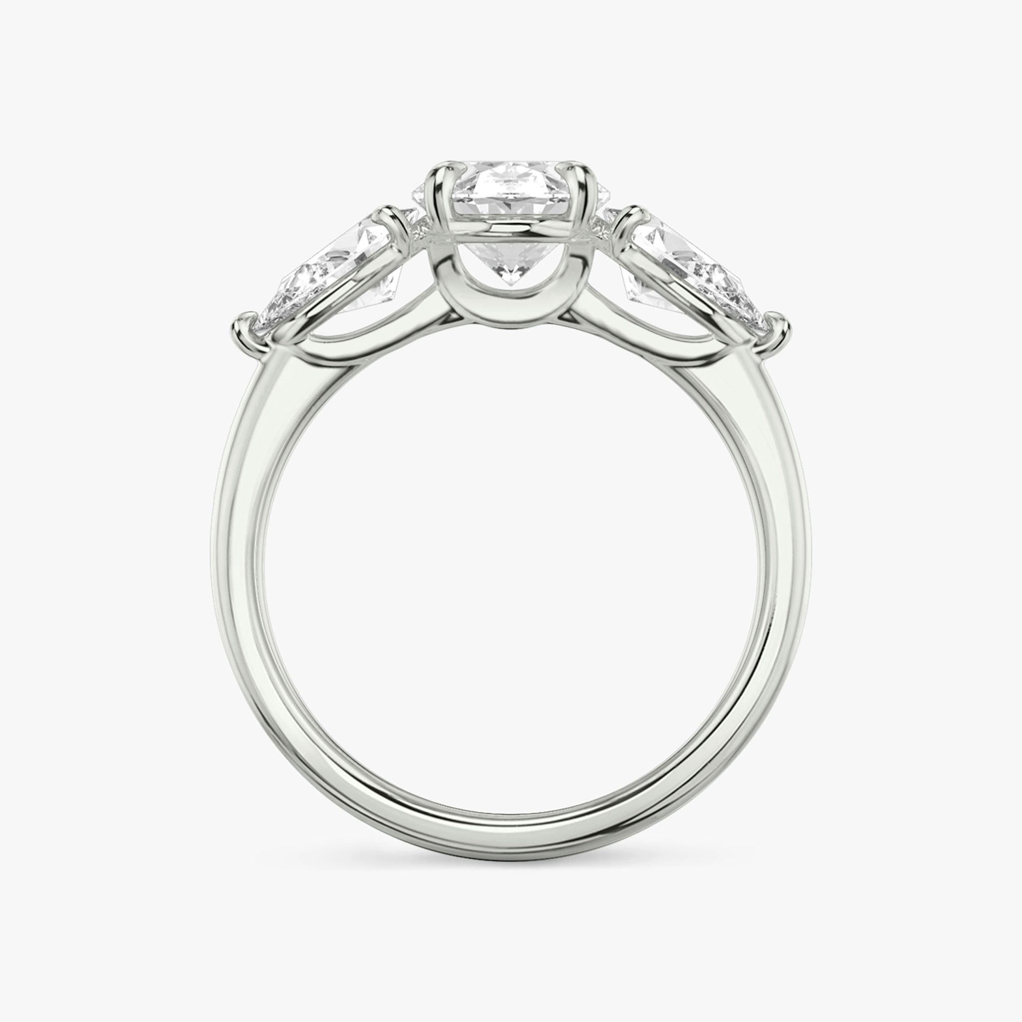 The Three Stone | Oval | 18k | White Gold | bandAccent: Plain | sideStoneCarat: 0.50ct | sideStoneShape: Pear | diamondOrientation: vertical | caratWeight: other