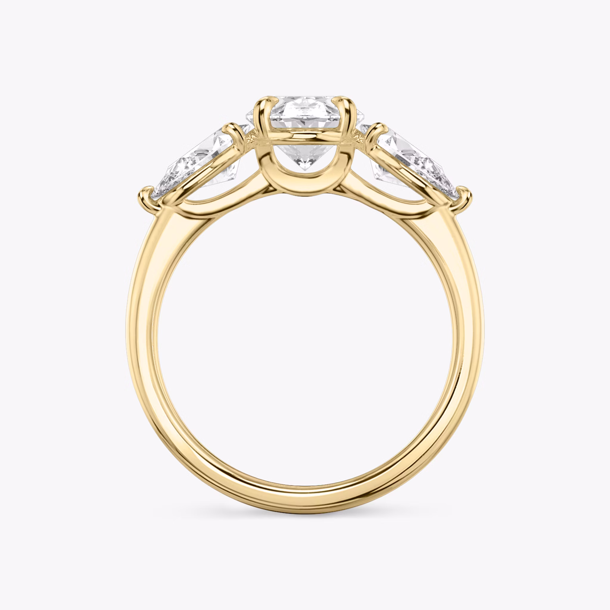 The Three Stone | Oval | 18k | Yellow Gold | bandAccent: Plain | sideStoneCarat: 0.50ct | sideStoneShape: Pear | diamondOrientation: vertical | caratWeight: other