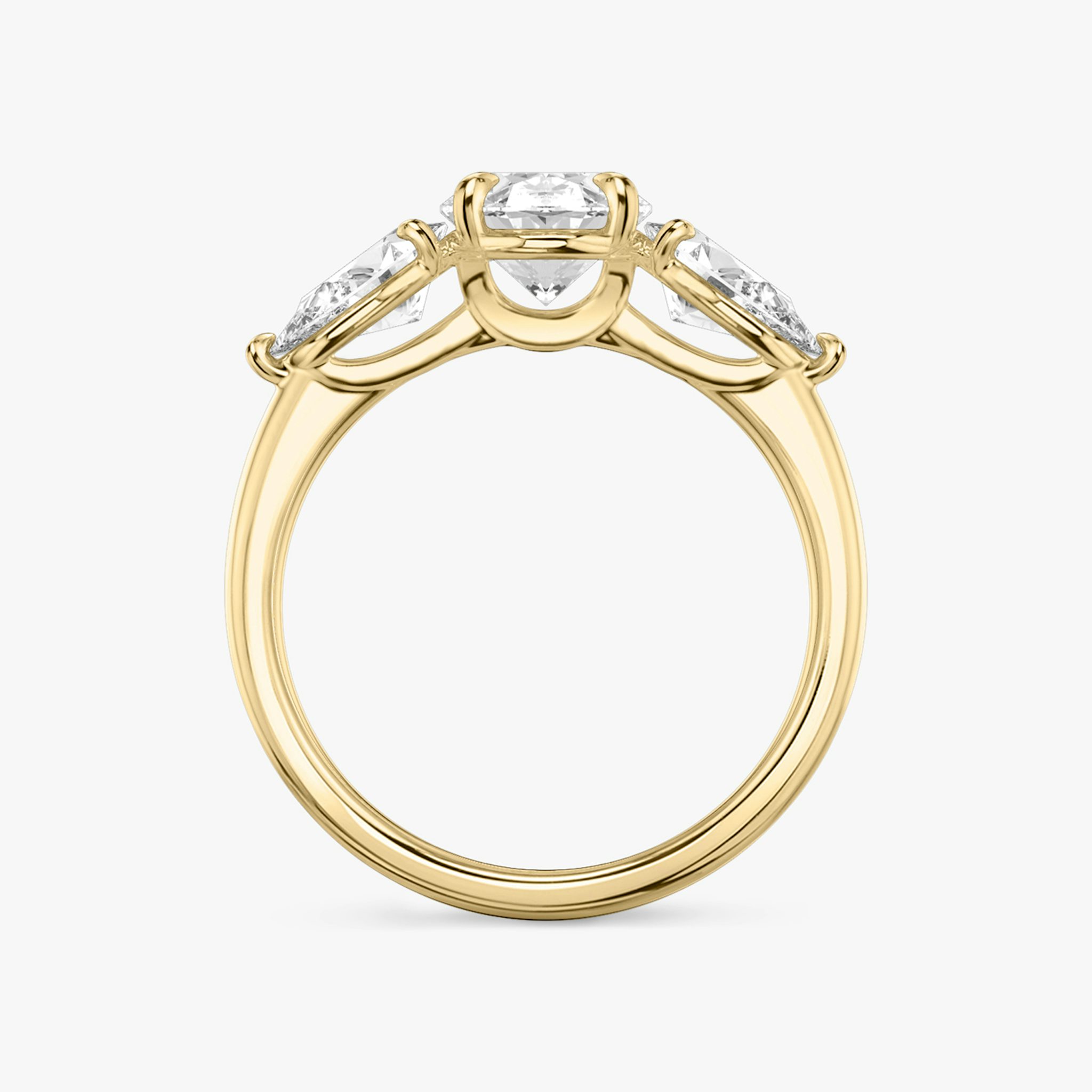 The Three Stone | Oval | 18k | Yellow Gold | bandAccent: Plain | sideStoneCarat: 0.50ct | sideStoneShape: Pear | diamondOrientation: vertical | caratWeight: other