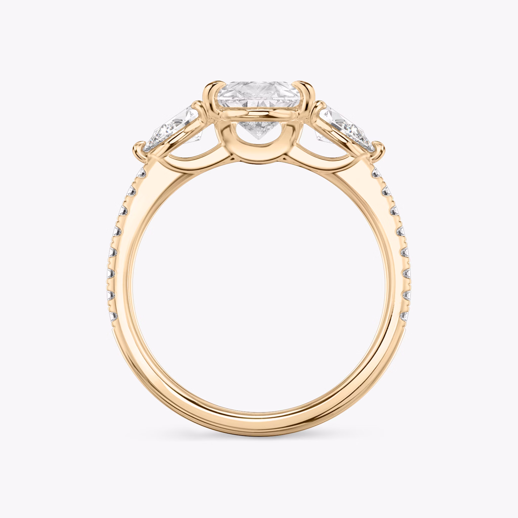 The Three Stone | Pear | 14k | Rose Gold | bandAccent: Pavé | sideStoneCarat: 0.25ct | sideStoneShape: Pear | diamondOrientation: vertical | caratWeight: other